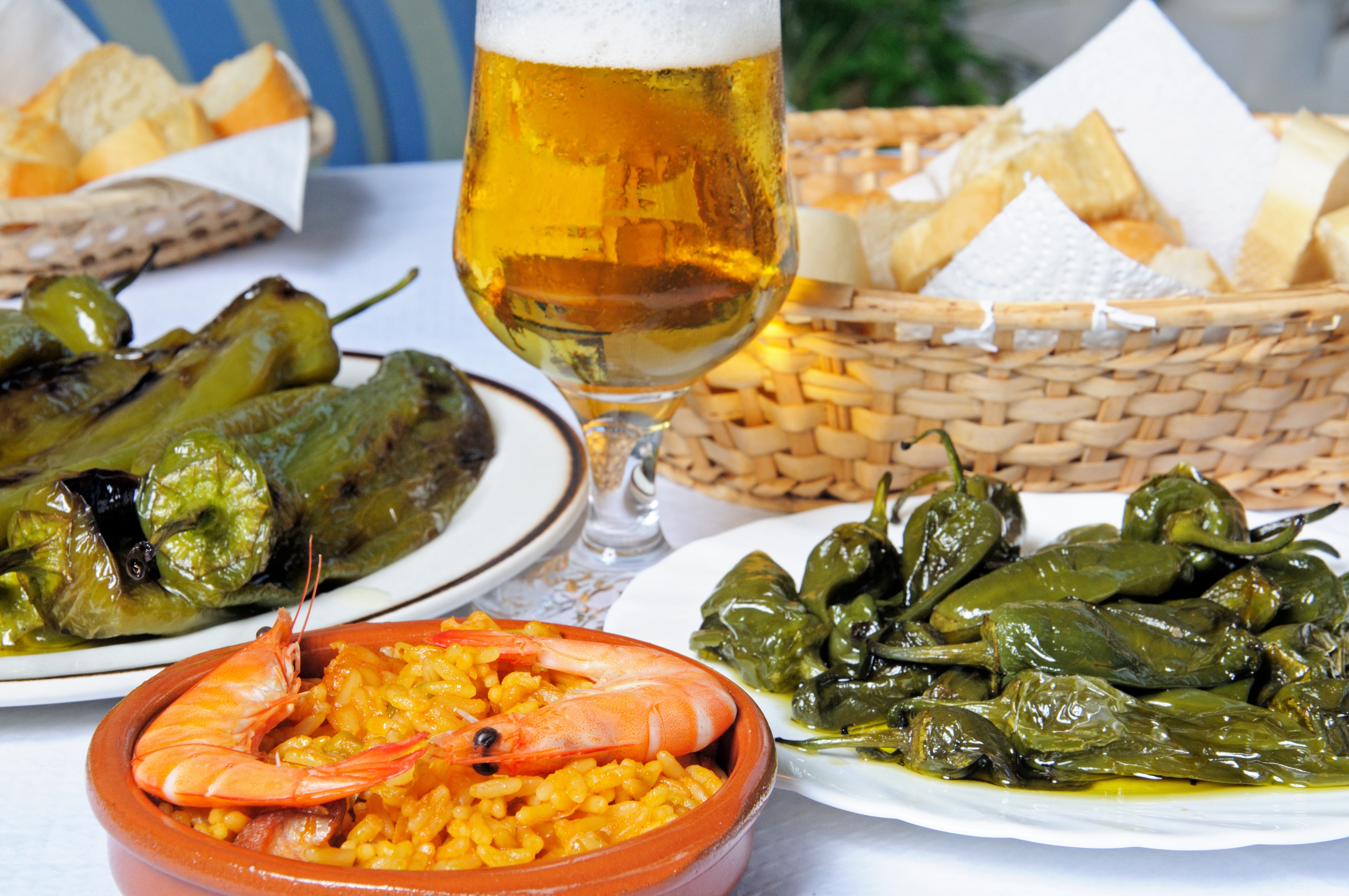 Tapas, Padron peppers, Deep fried pointed peppers, seafood and pork paella, Costa del Sol, Malaga Province, Andalucia, Spain, Western Europe