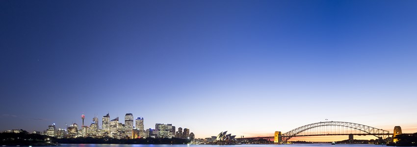 Panoramic view of Sydney Harbour at night