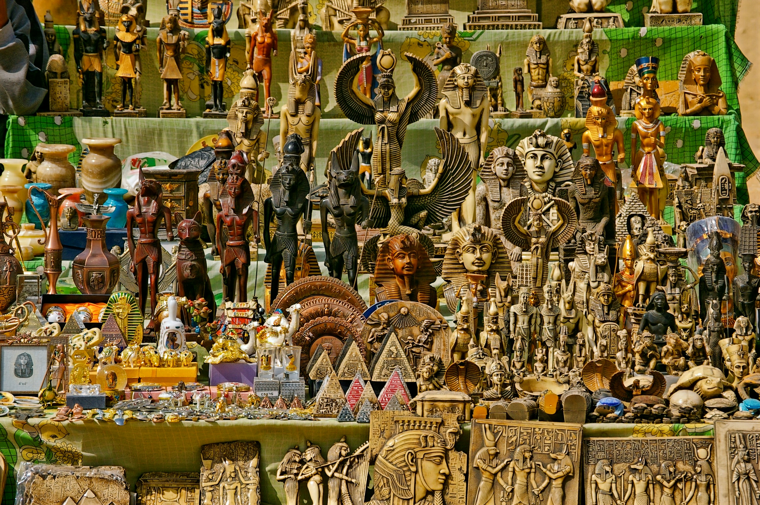 a large assortment of figurines on display in a store Khan el Khalili, Cairo, Egypt.