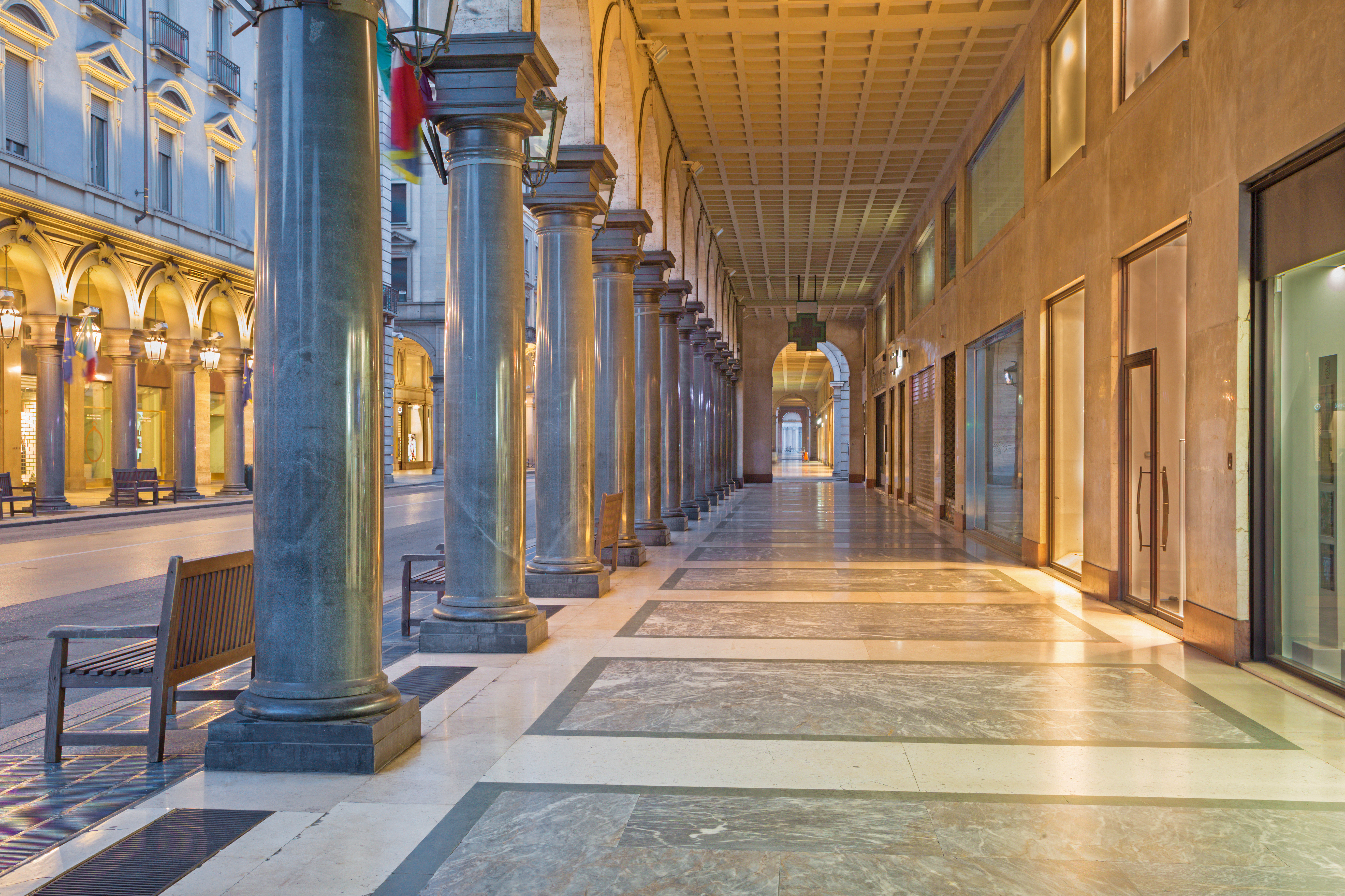 Turin - The porticoes of of Via roma street at dusk.