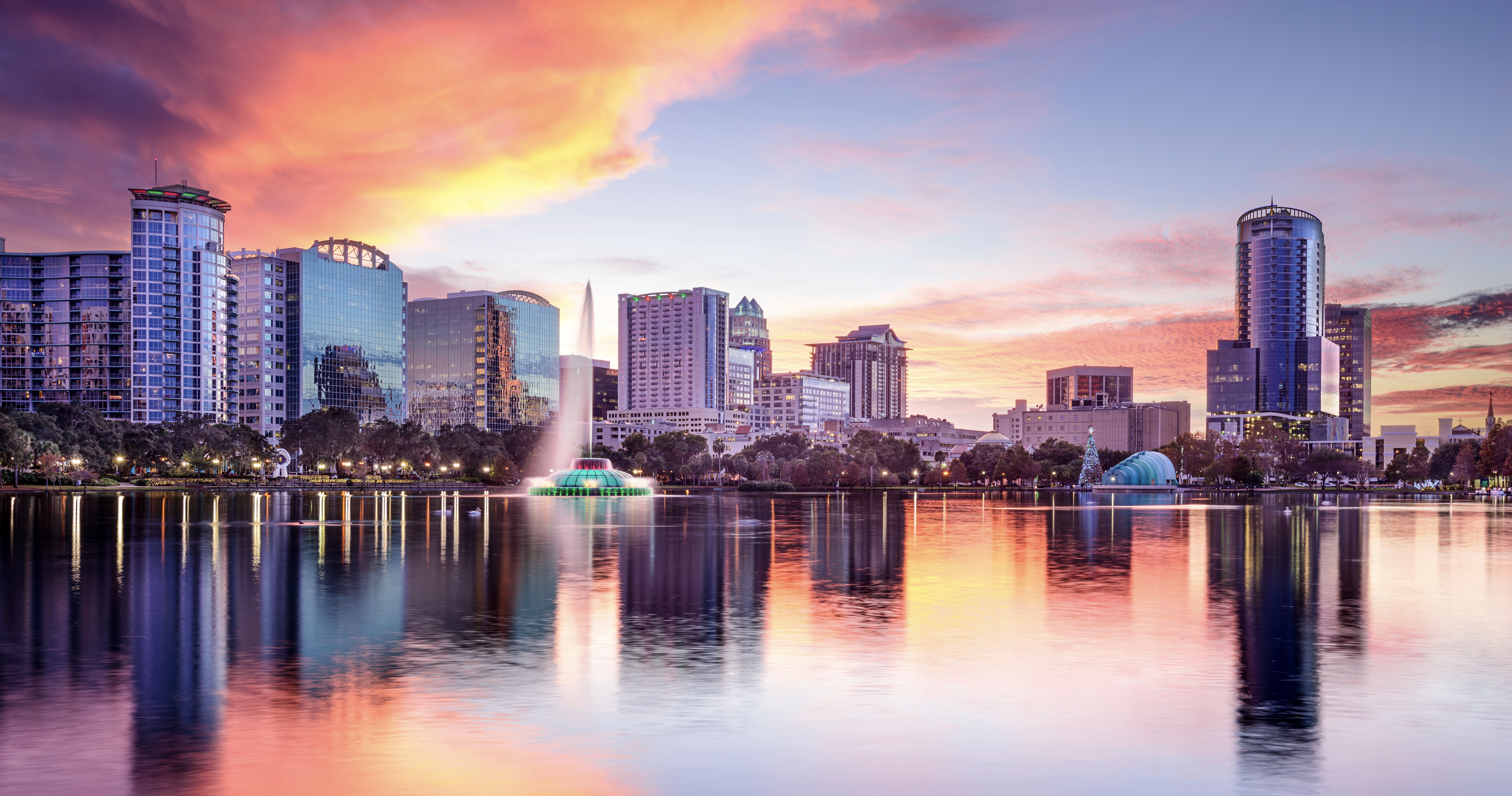 Orlando, Florida, USA downtown city skyline from Eola Park