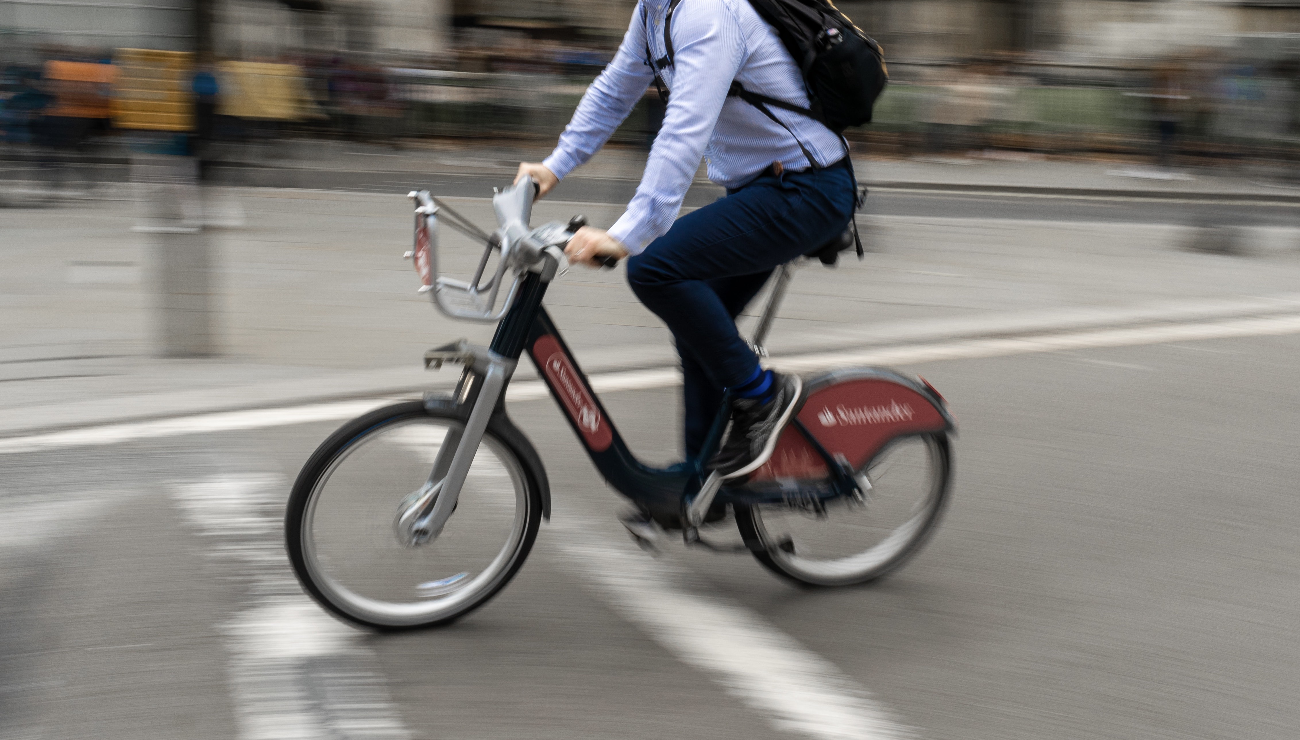 man on a Santander Bike in London