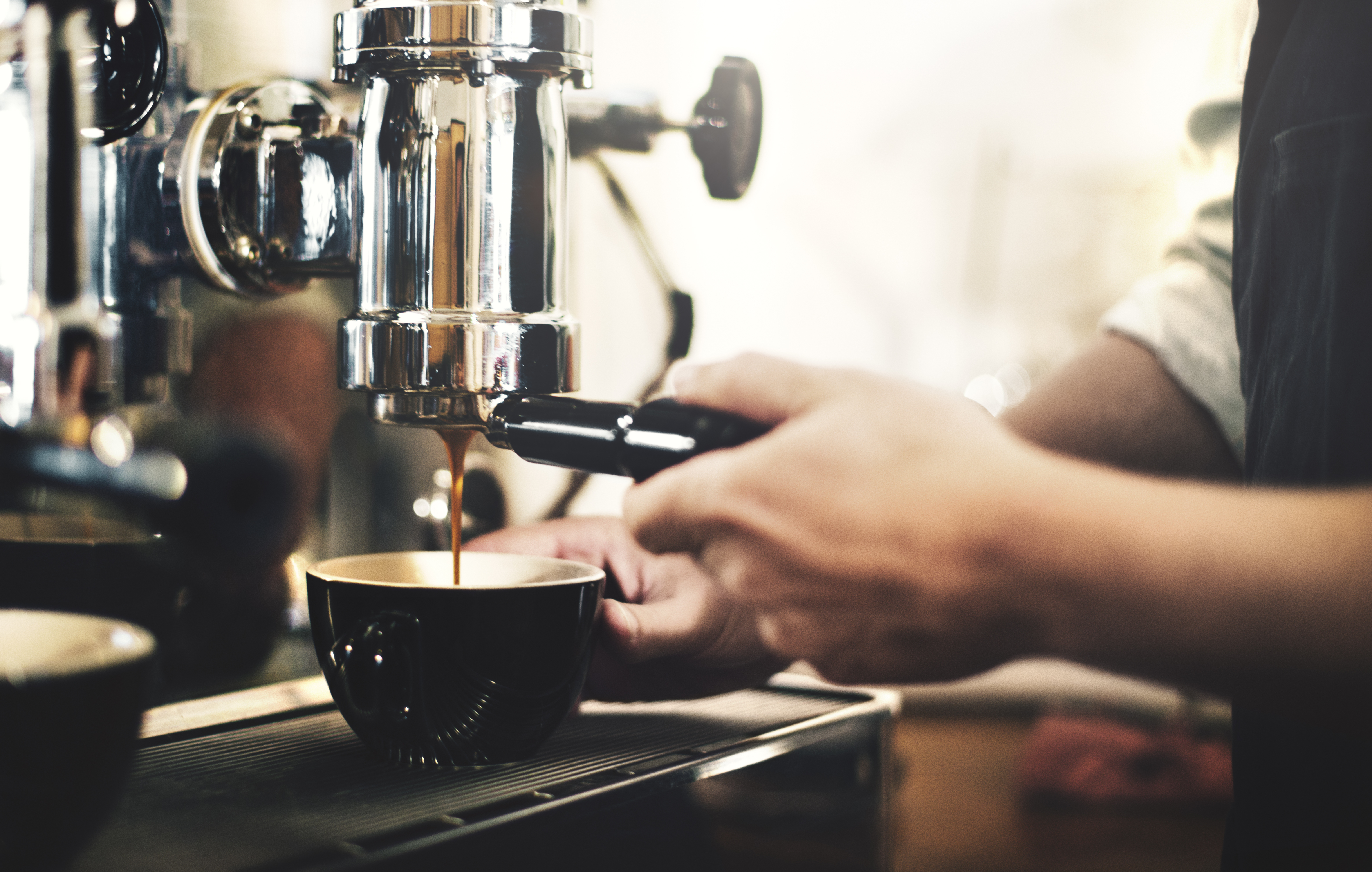 Barista making coffee