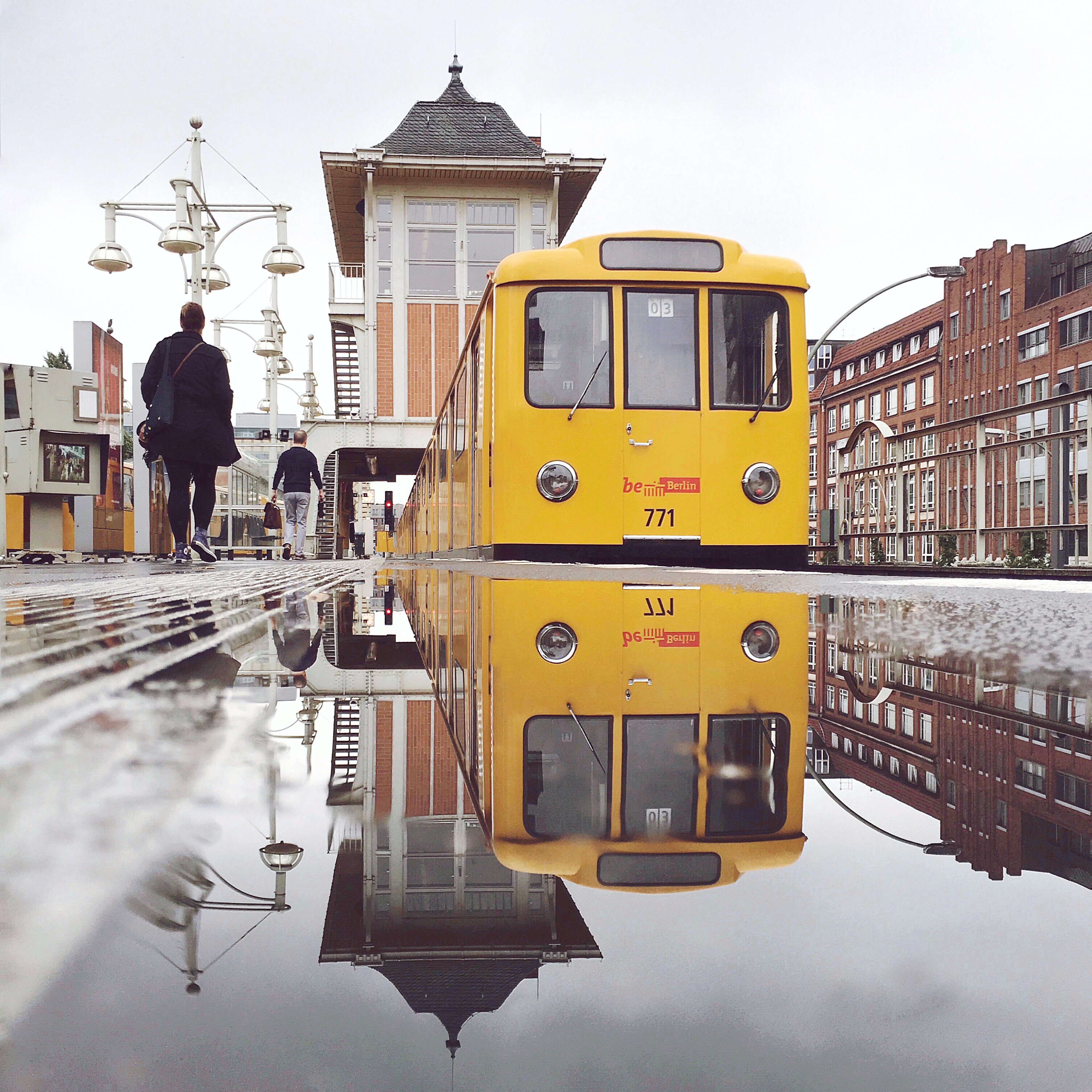 a yellow subway train in Berlin, Germany