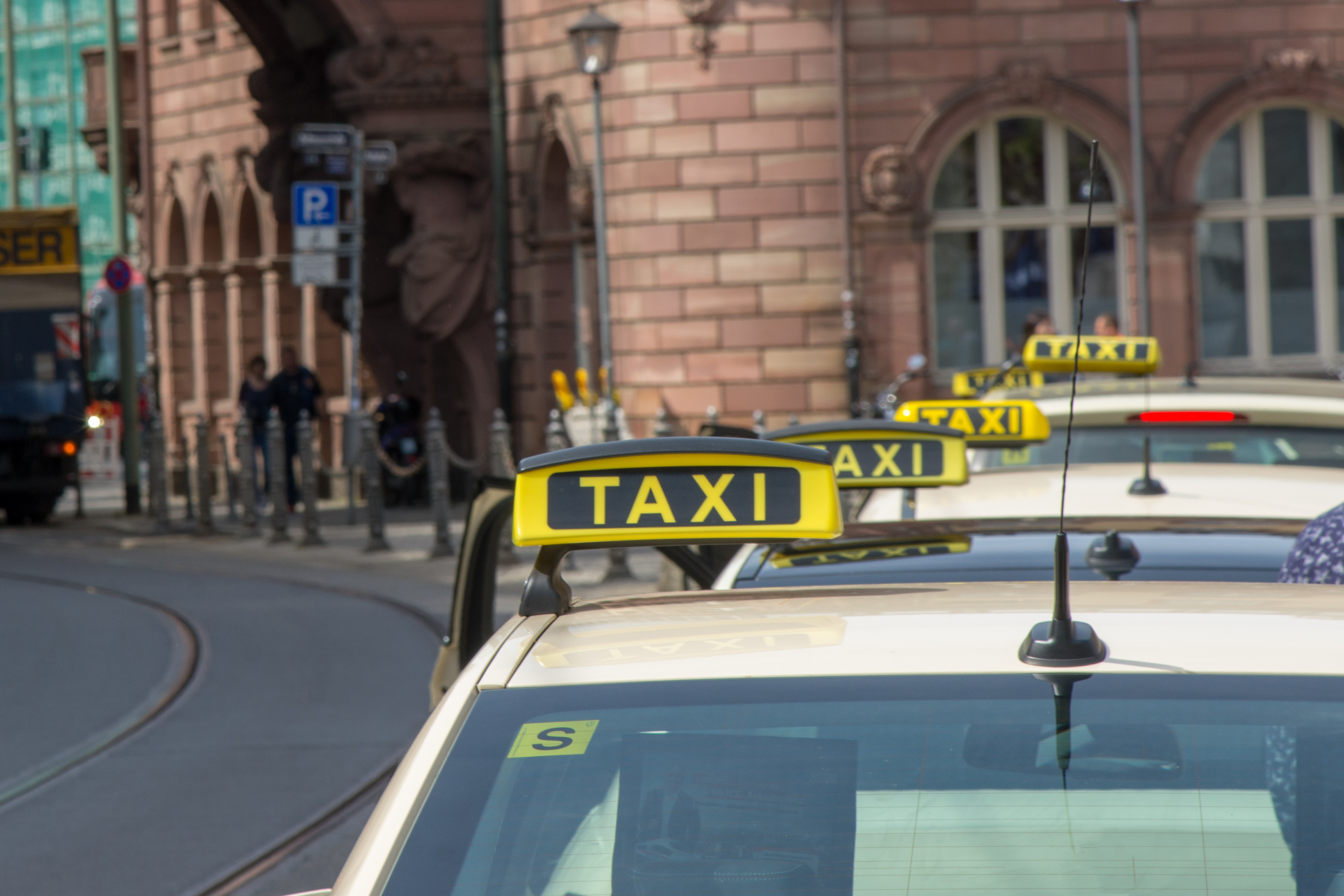German taxi cars waiting in line at a cab stand near Römerberg in Frankfurt am Main, Germany