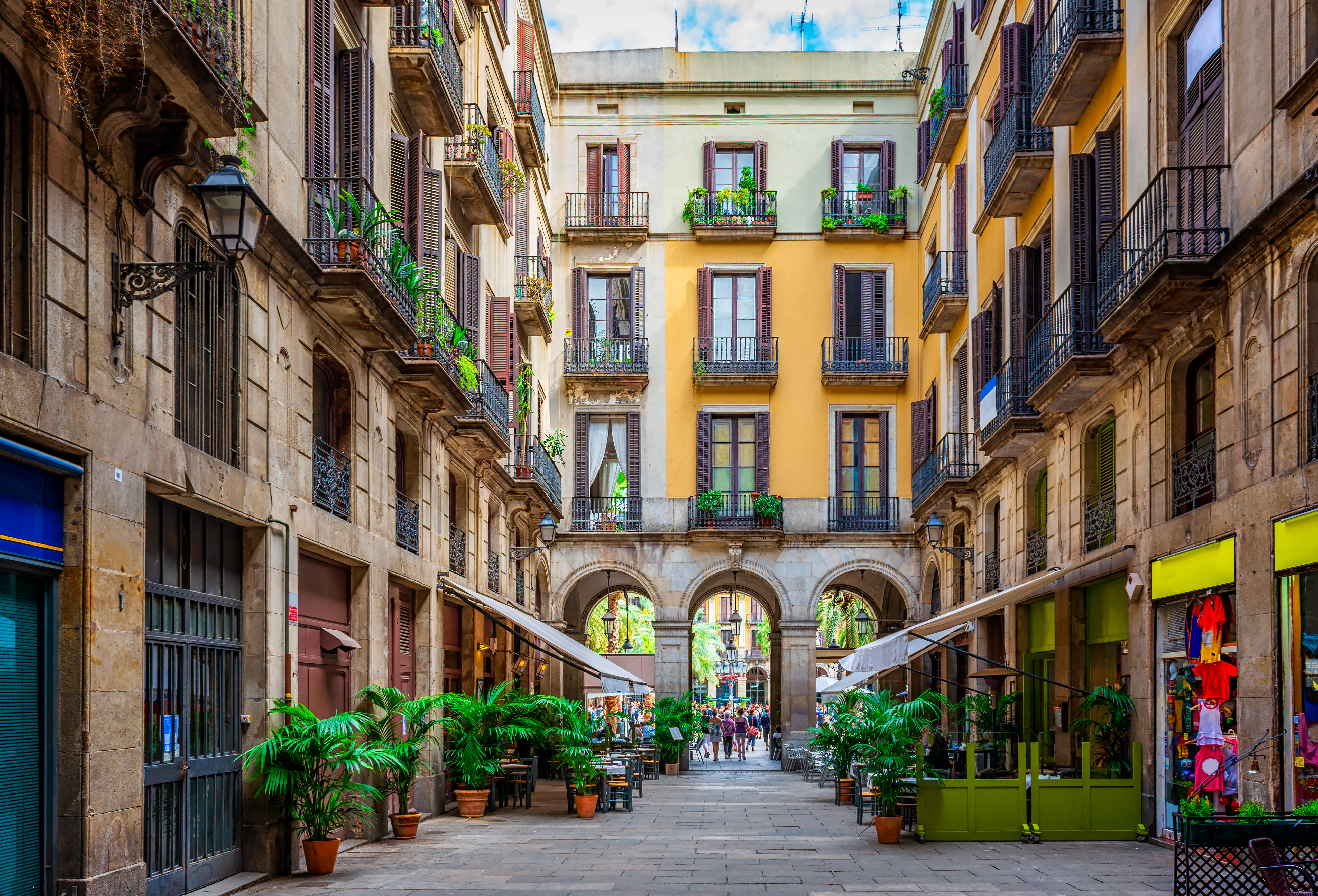 Old narrow street in Barcelona, Catalonia, Spain. Architecture and landmark of Barcelona. Cozy cityscape of Barcelona