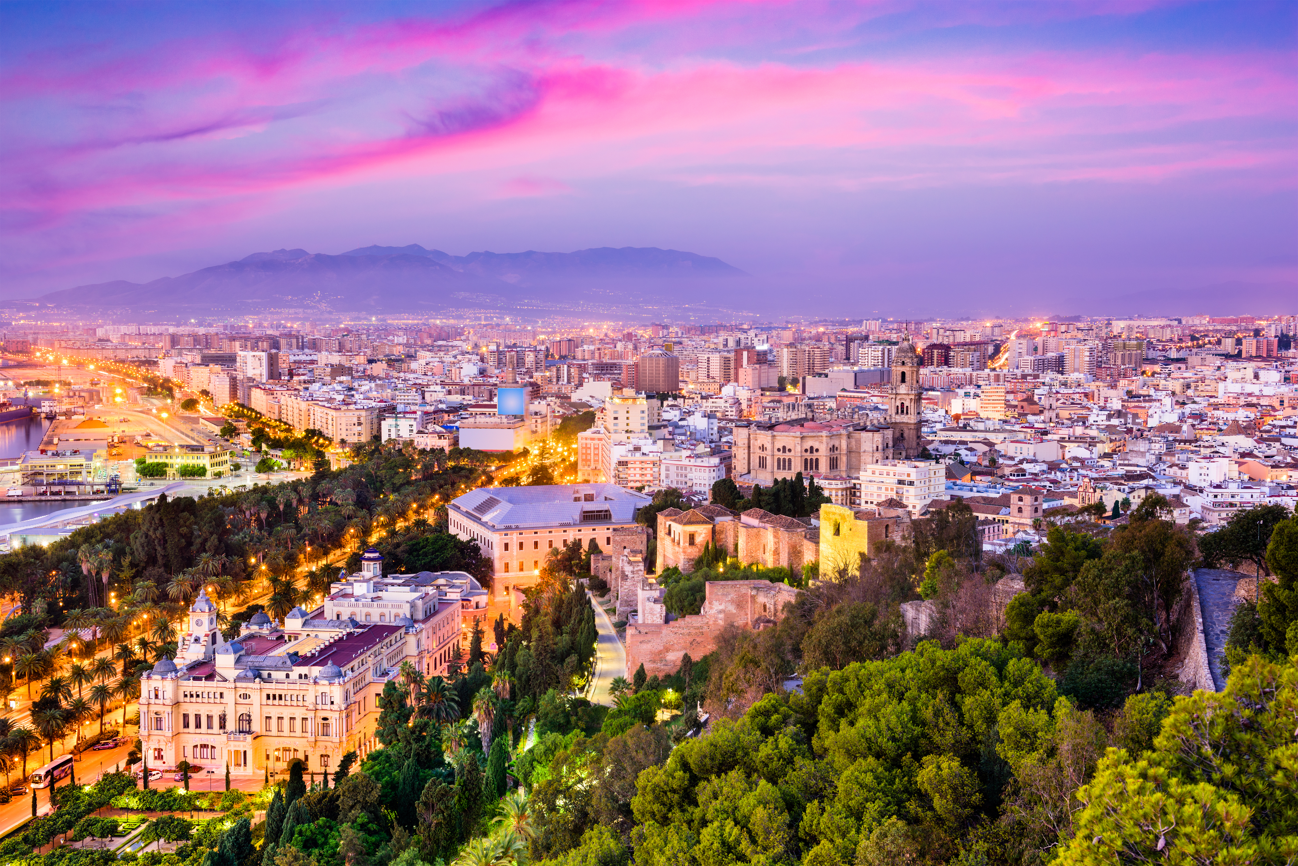 Malaga, Spain cityscape at the Cathedral, City Hall and Alcazaba citadel of Malaga.