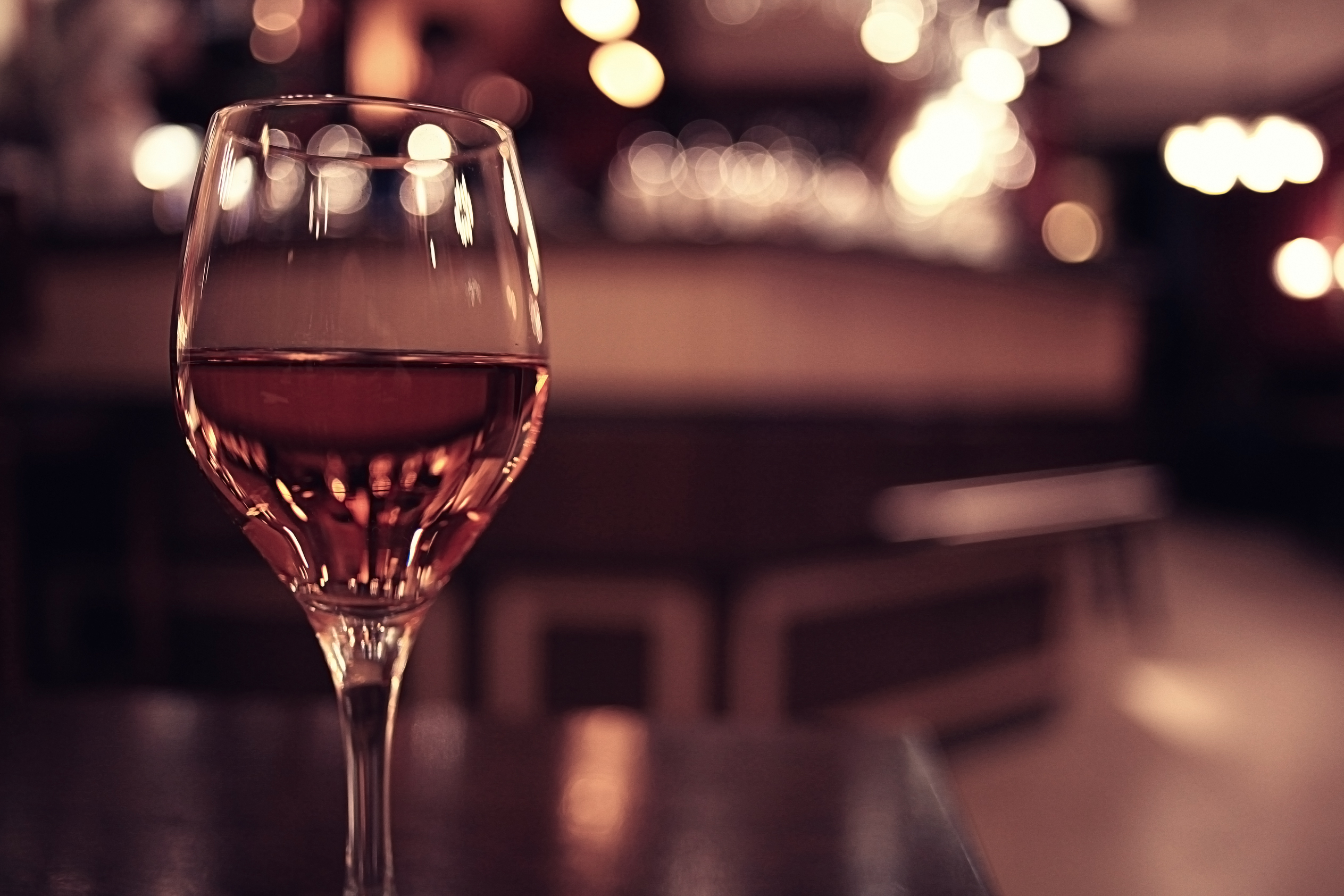 glass of wine restaurant interior serving dinner