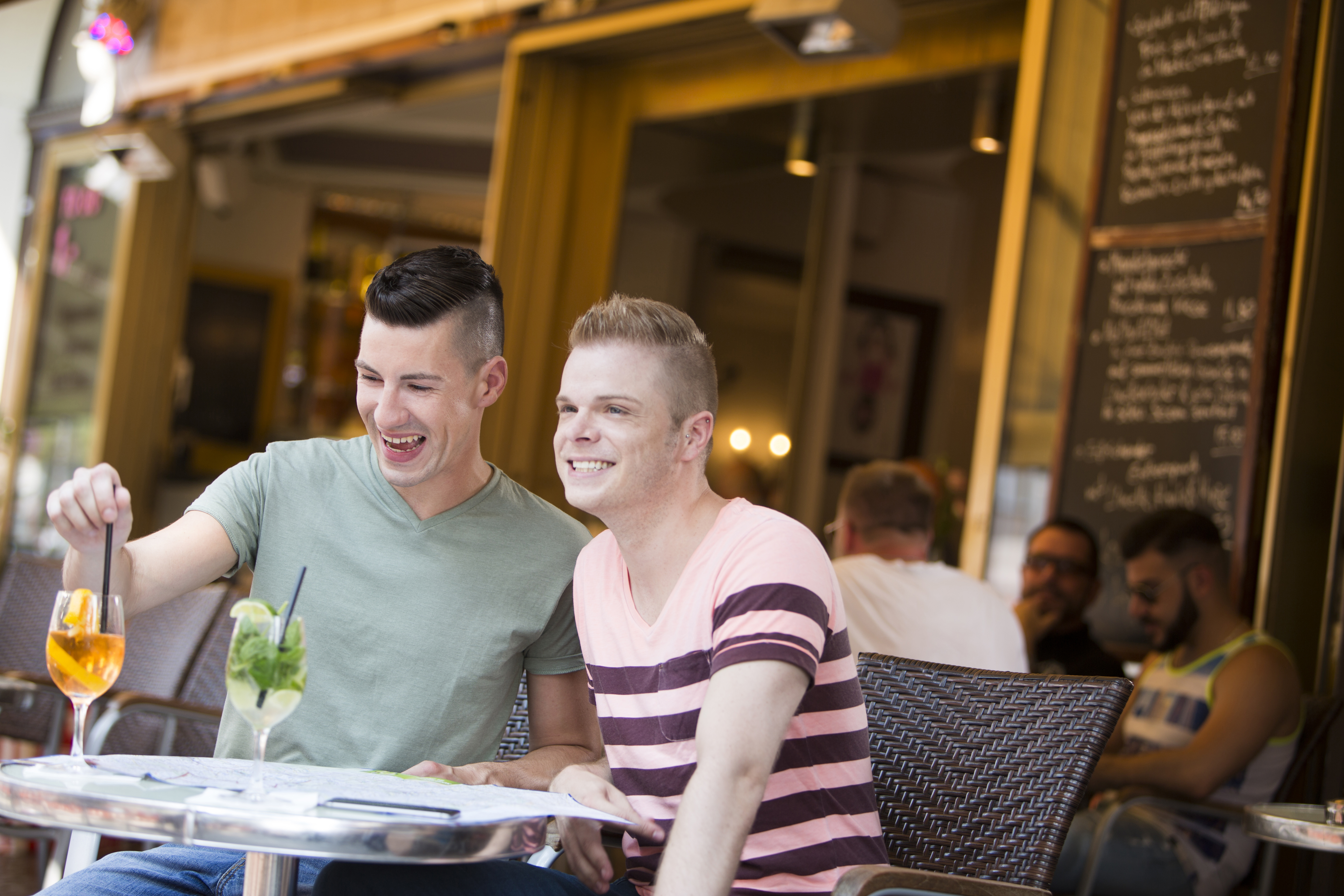 A gay couple at Cafe Berio Schöneberg, Berlin, Germany