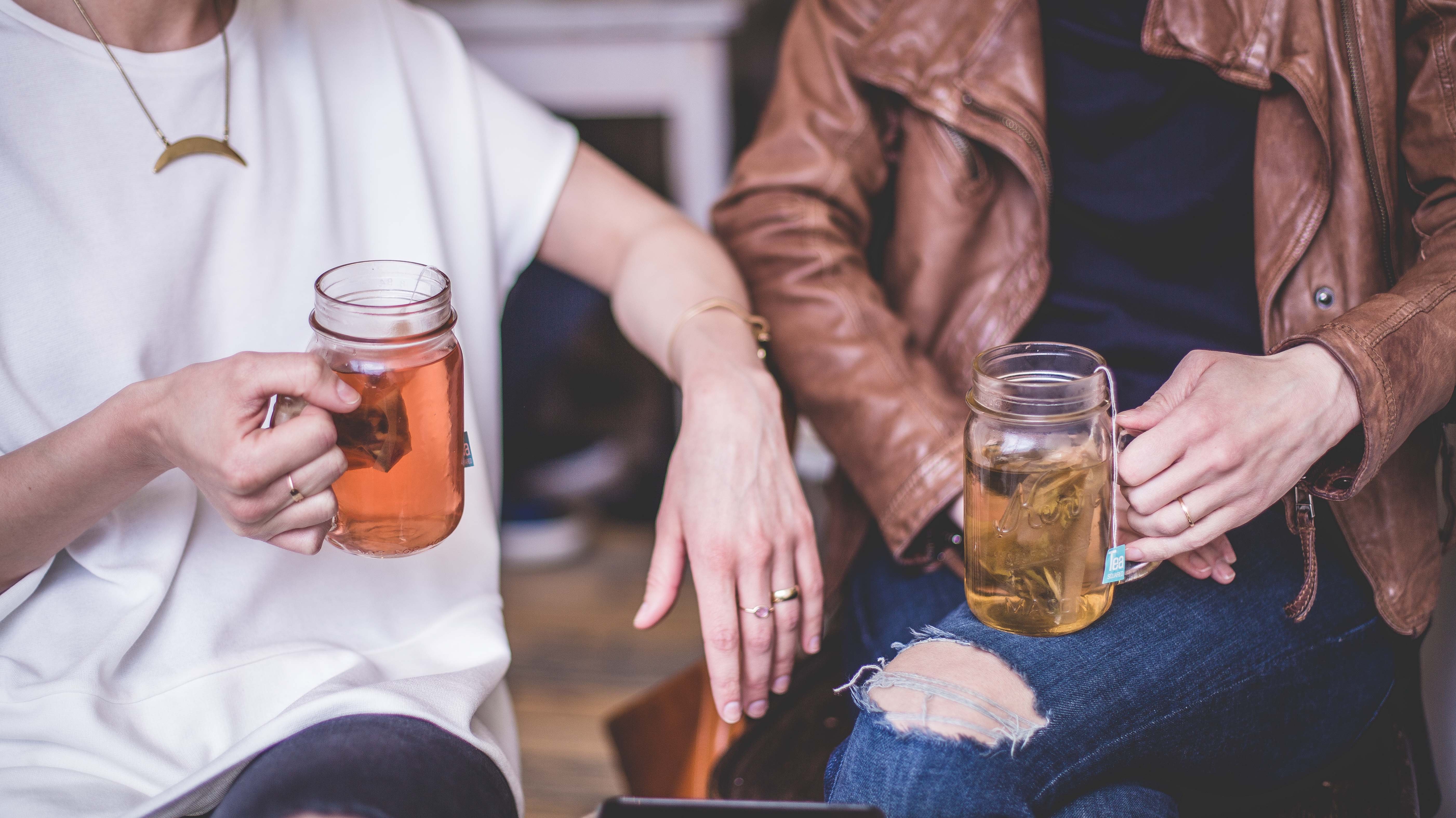 Friends talking over tea