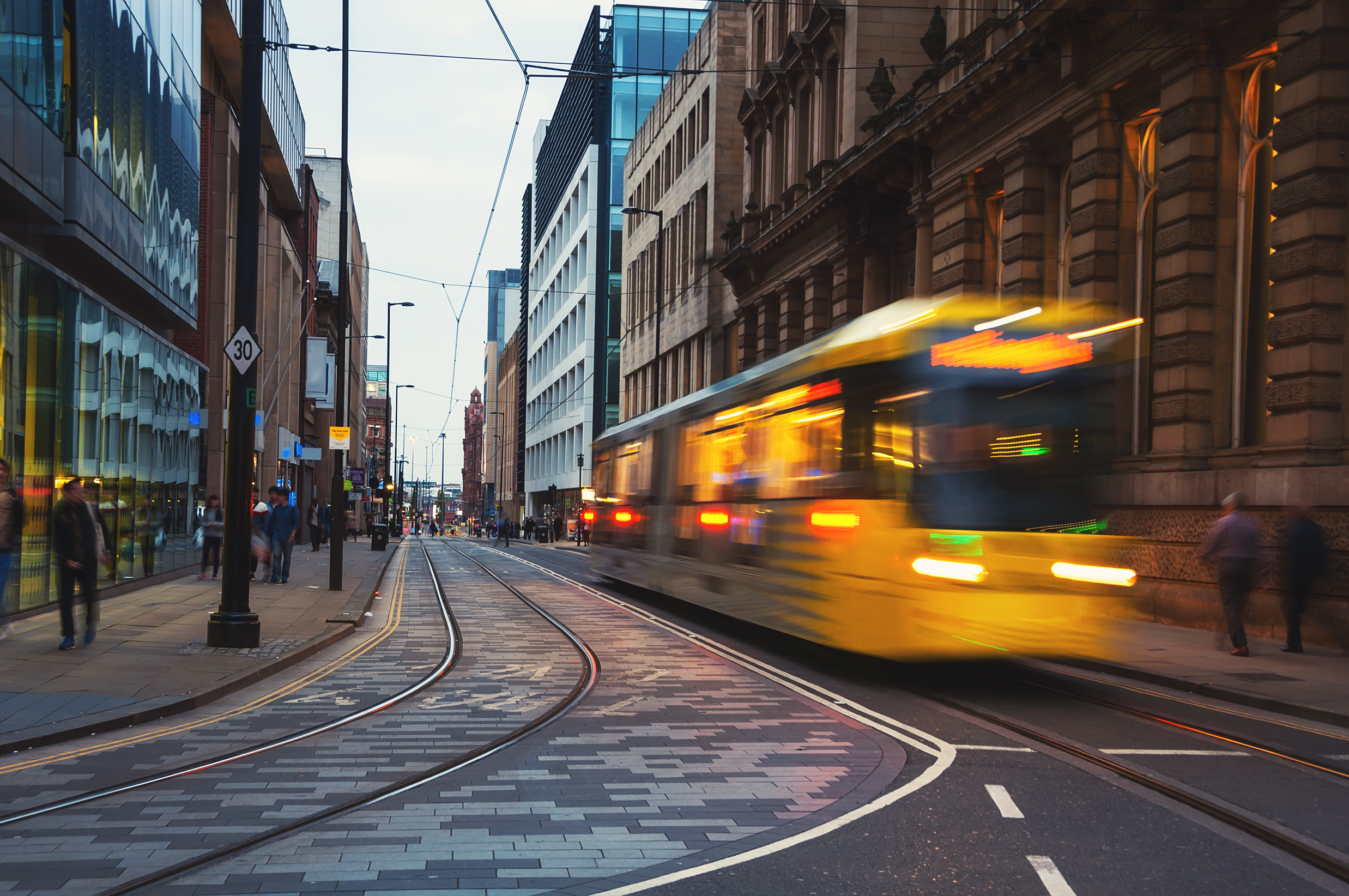 Light rail Metrolink tram in the city center of Manchester, UK