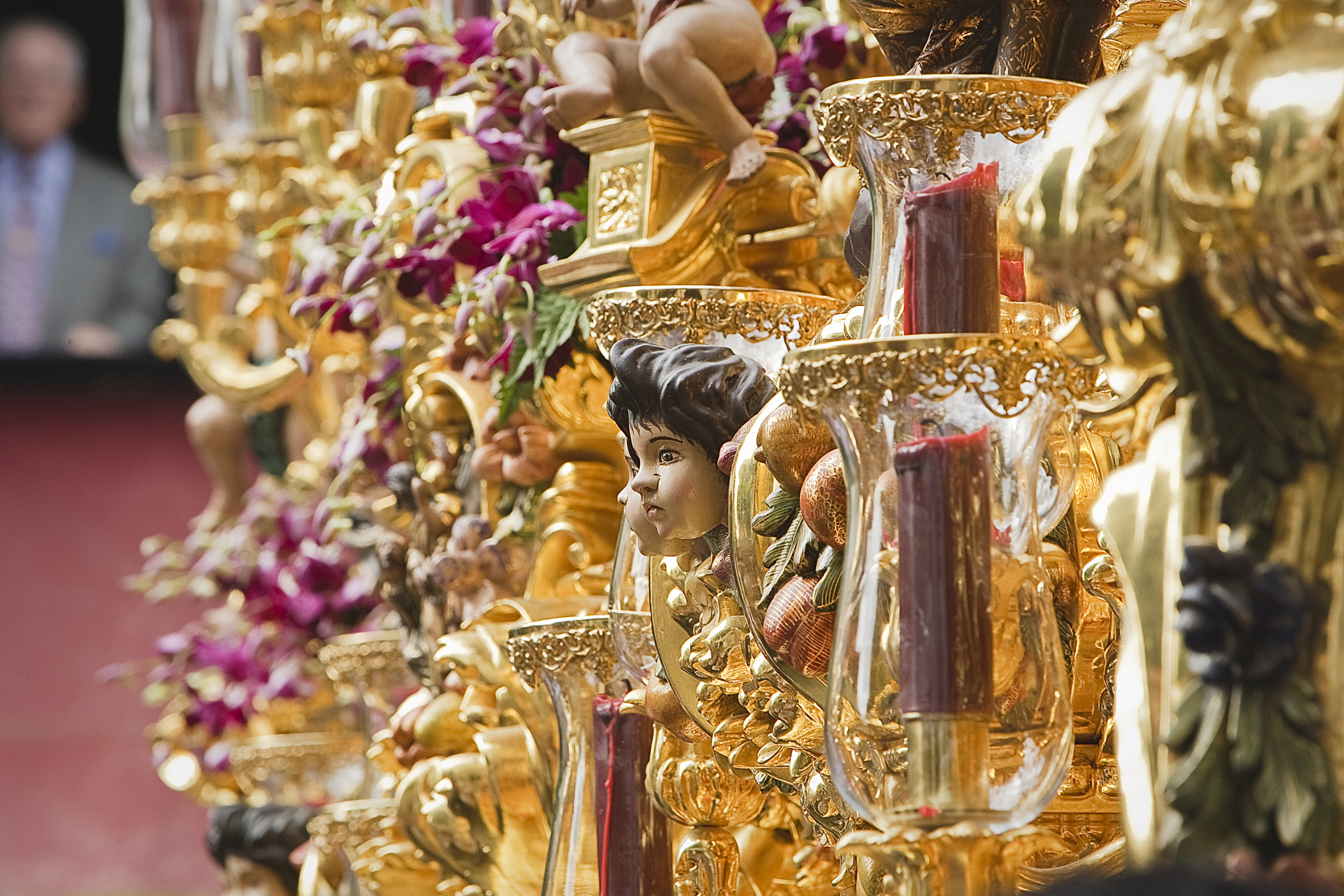 Cherub on wood carving, holy week, Seville, Andalusia, Spain