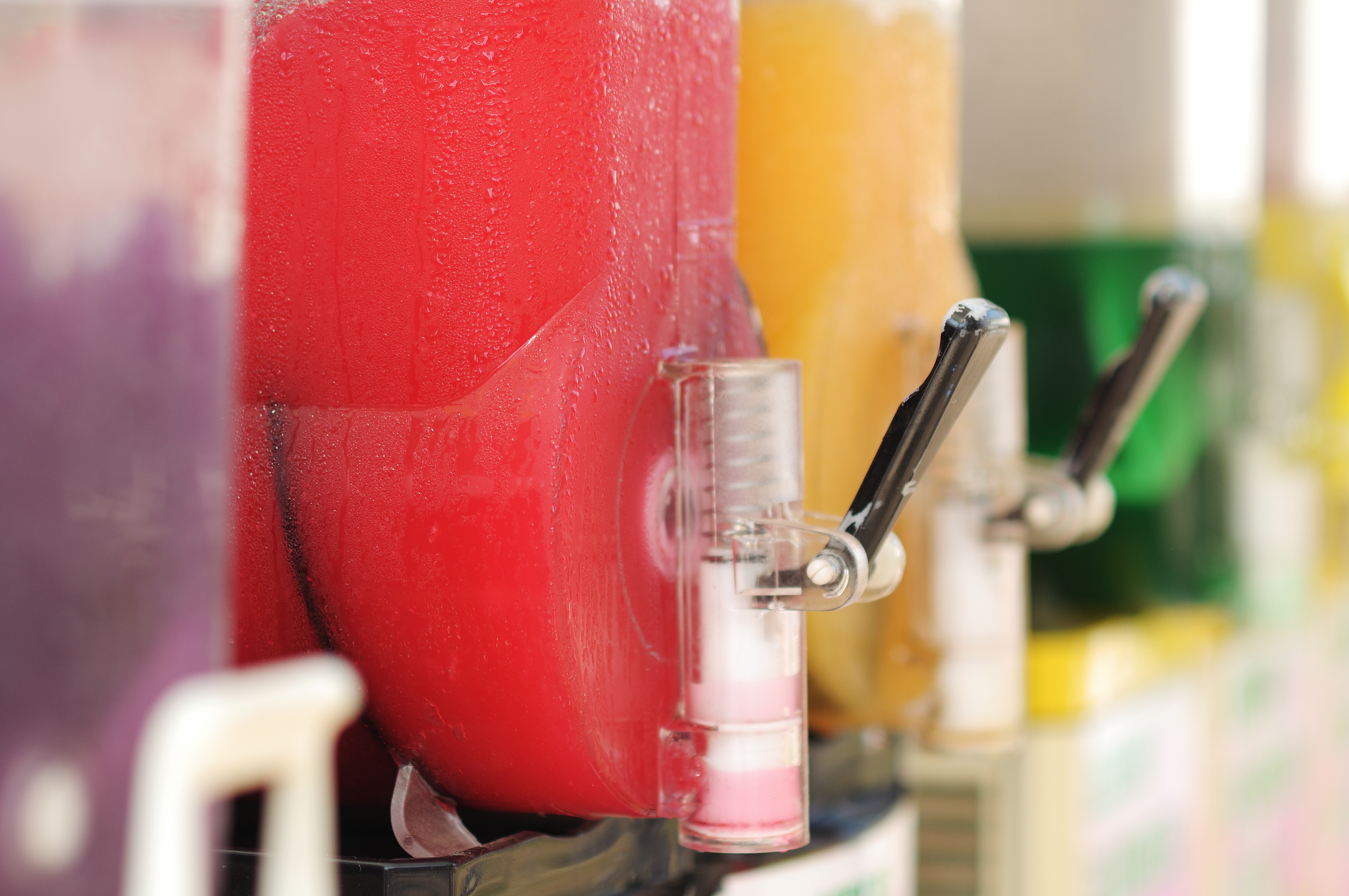 Granita machine. Slush machine. Granita distributor. Ice drink, different flavors.