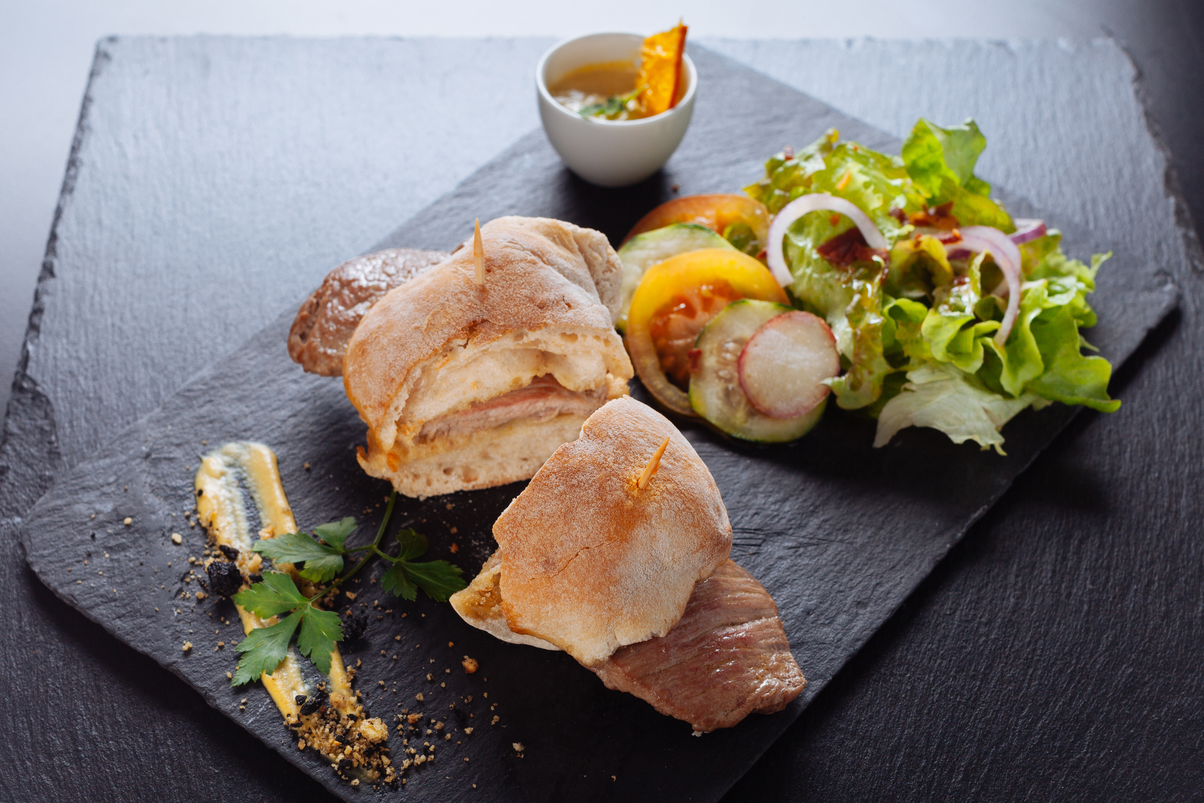 Portuguese steak sandwich with salad