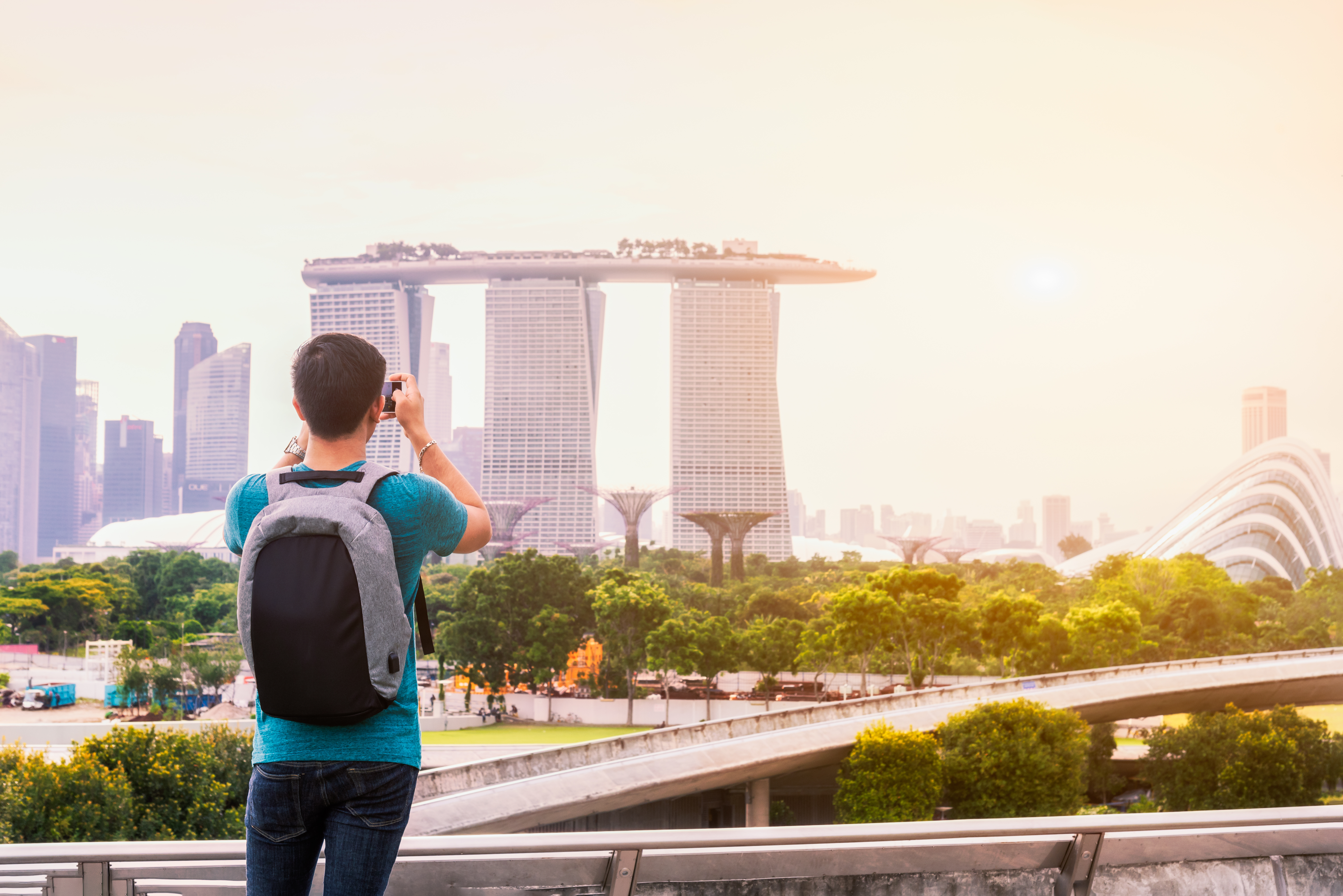 Photographer or traveller using smart phone camera take photo