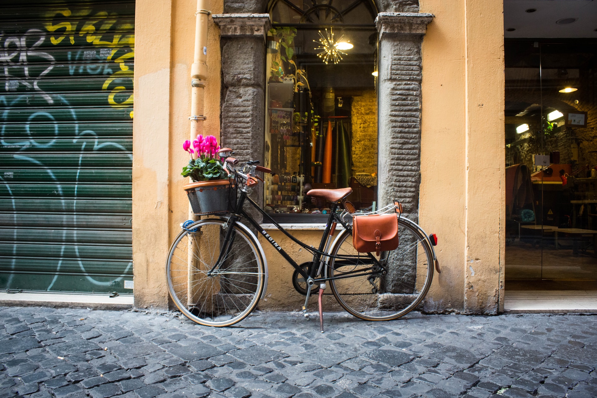 black bicycle in cobblestoned vintage street
