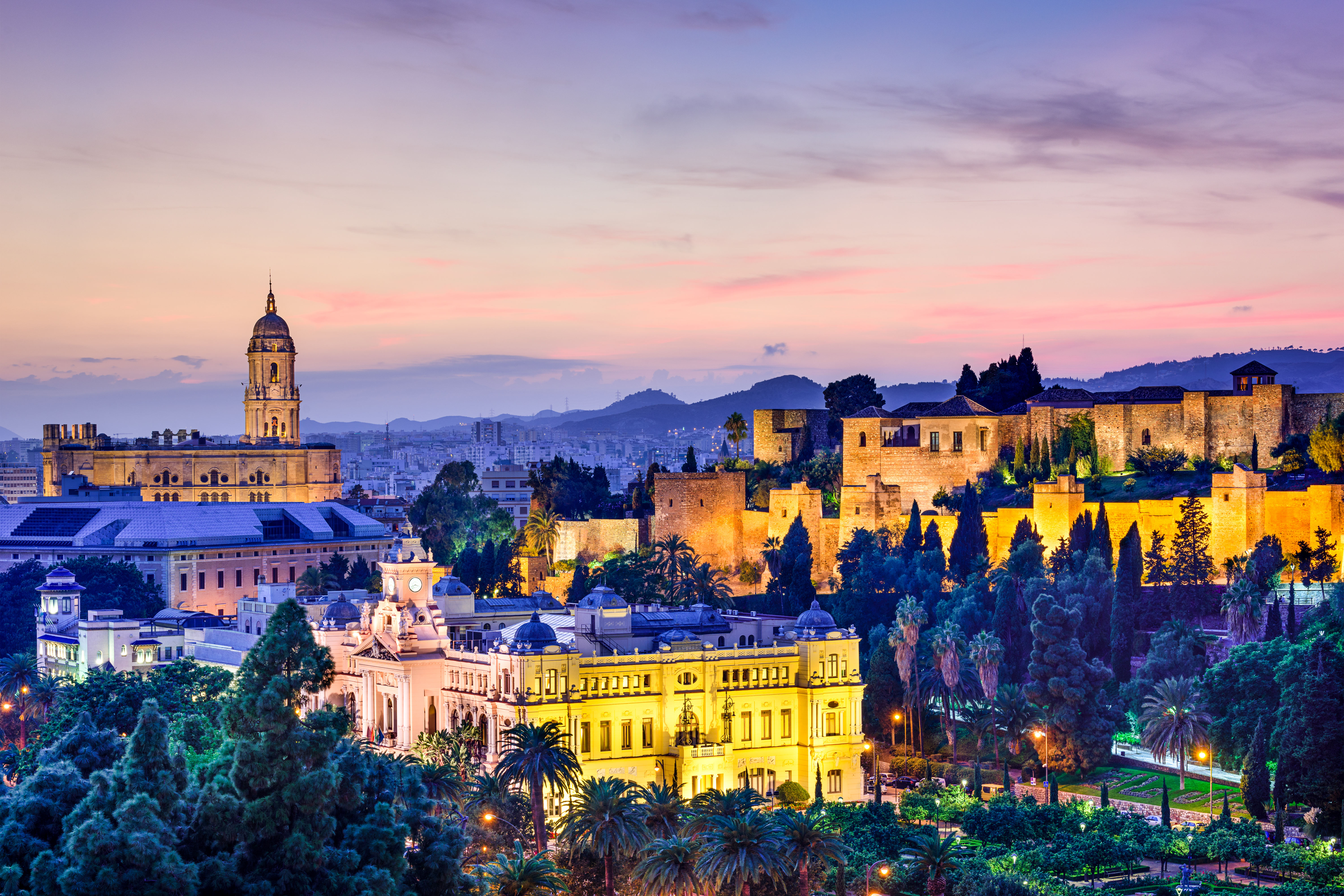 Malaga, Spain cityscape at the Cathedral, City Hall and Alcazaba citadel of Malaga.