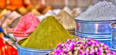 Spices in market - Corrado Baratta/Shutterstock.com