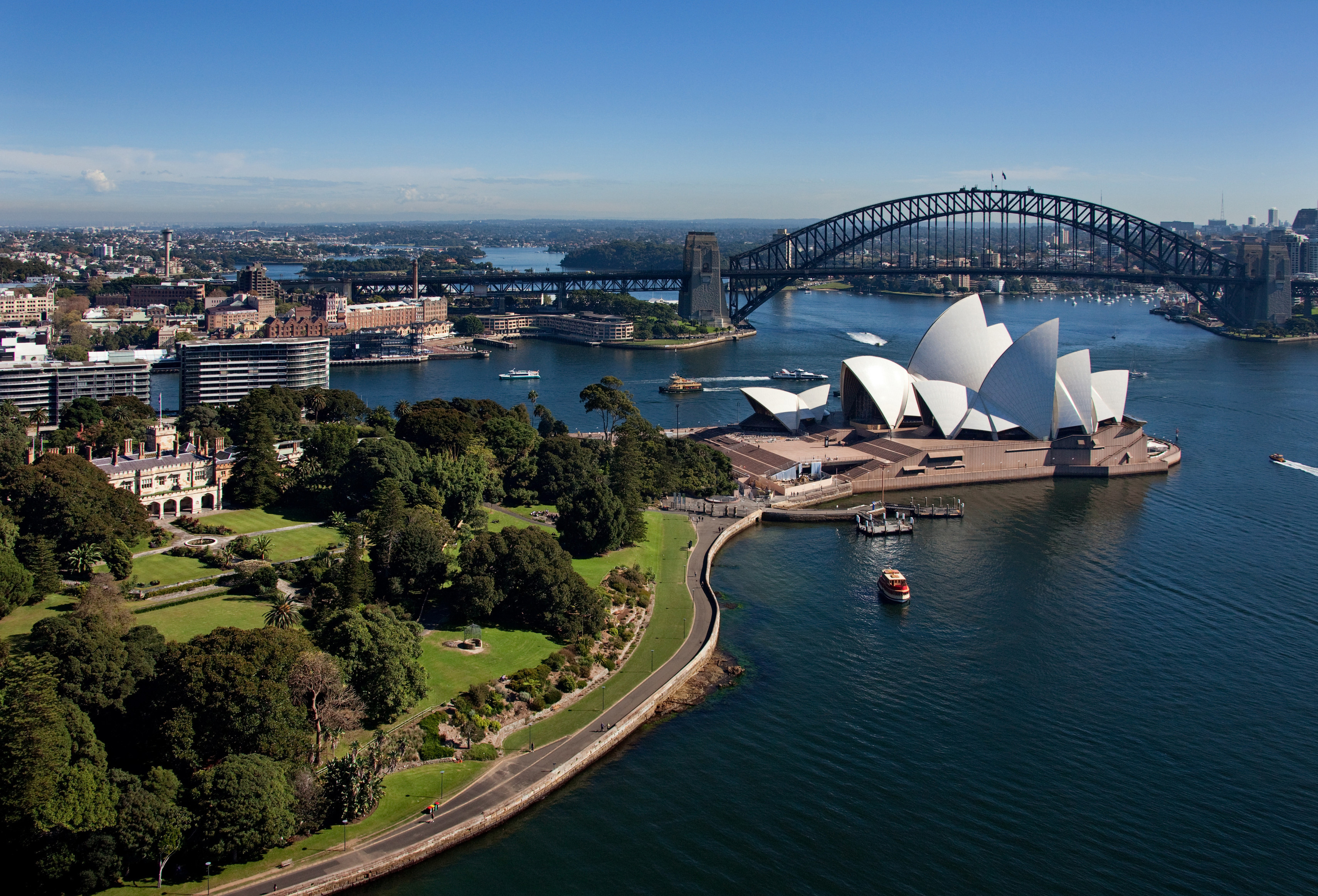 Aerial view of Sydney Harbour featuring the Royal Botanic Gardens, Sydney Opera House and Sydney Harbour Bridge