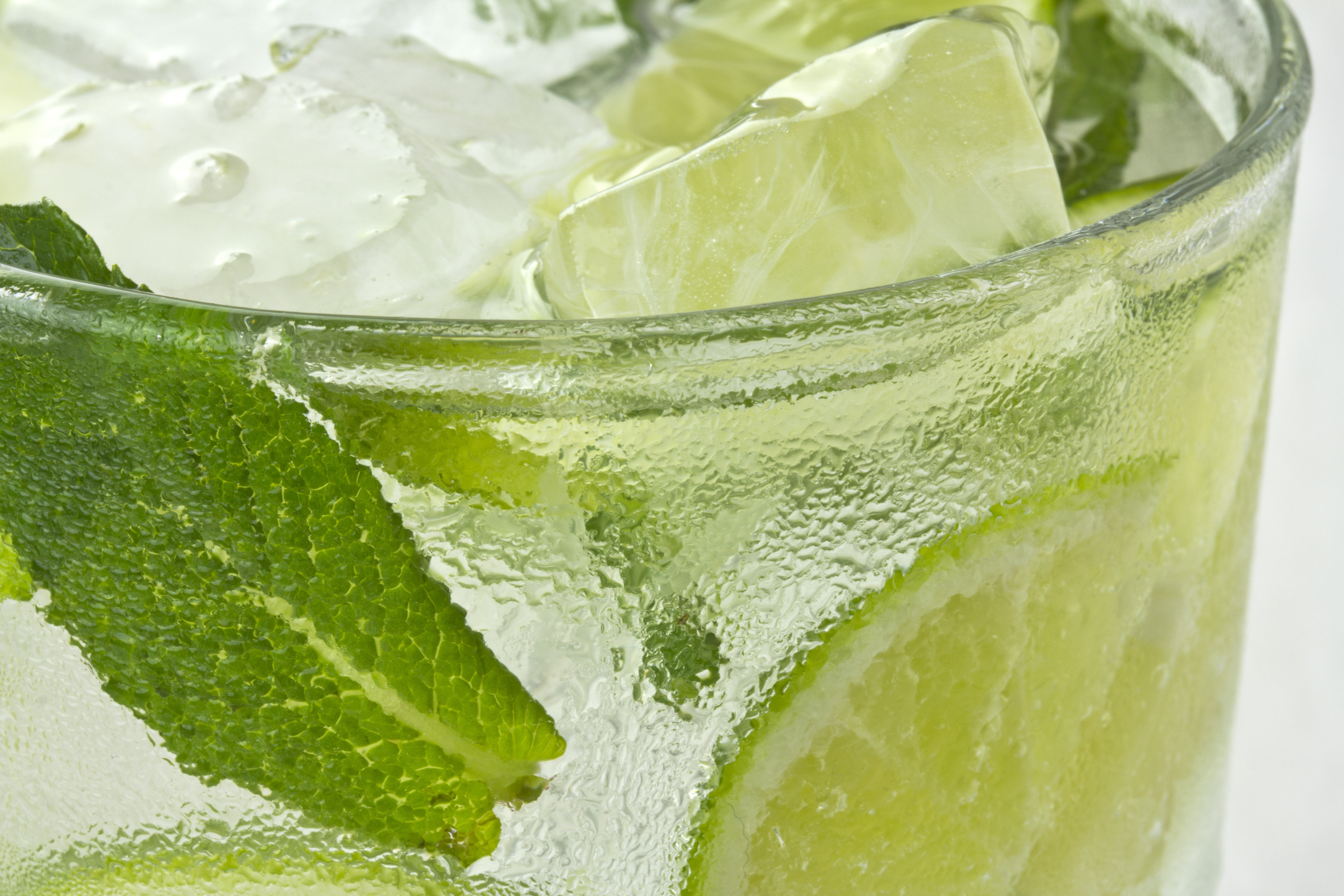 Mojito with lime, ice and mint leaves