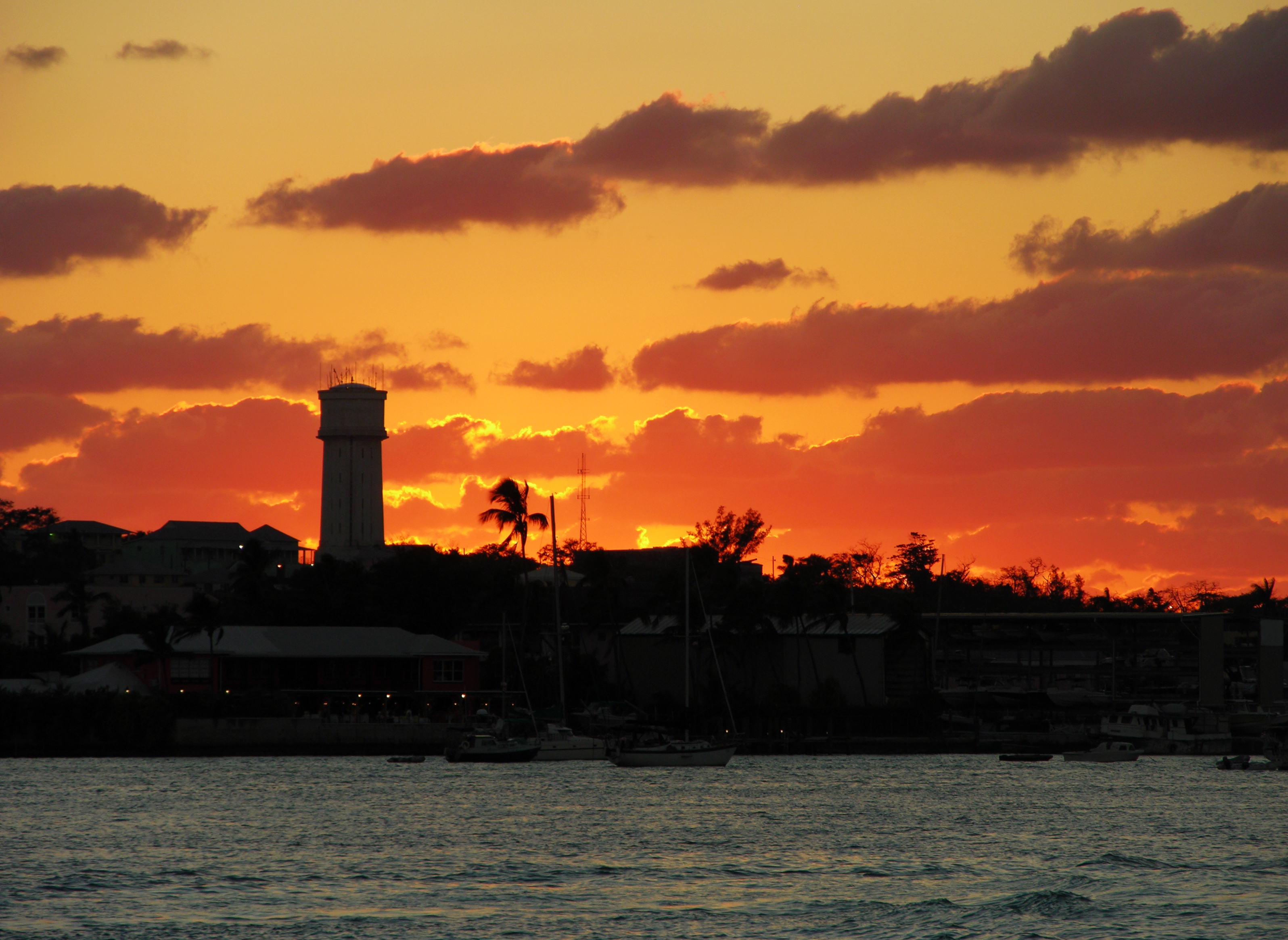 The dramatic sunset skyline over Nassau downtown