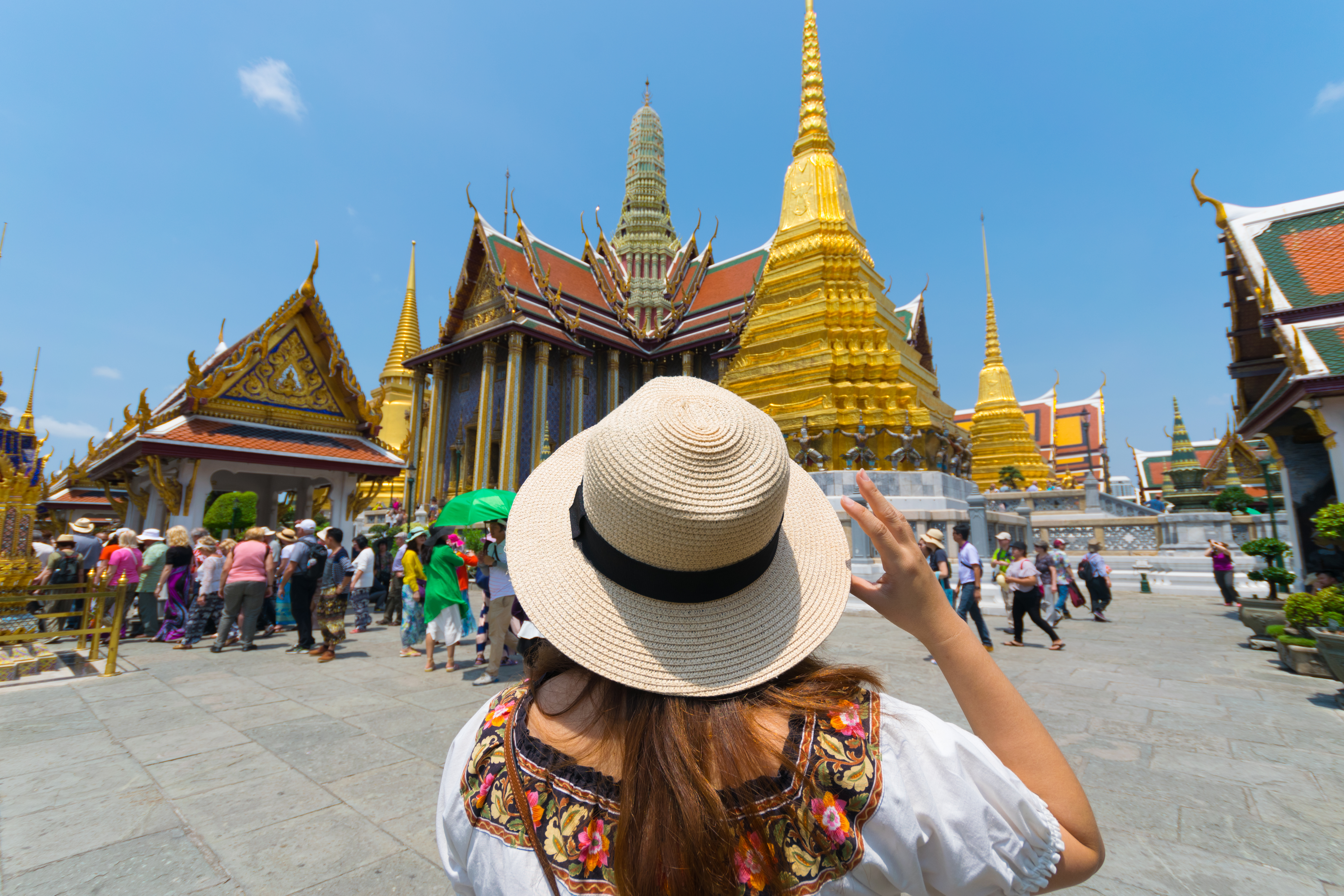 Tourist in Wat Phra Kaew in Bangkok, Thailand.