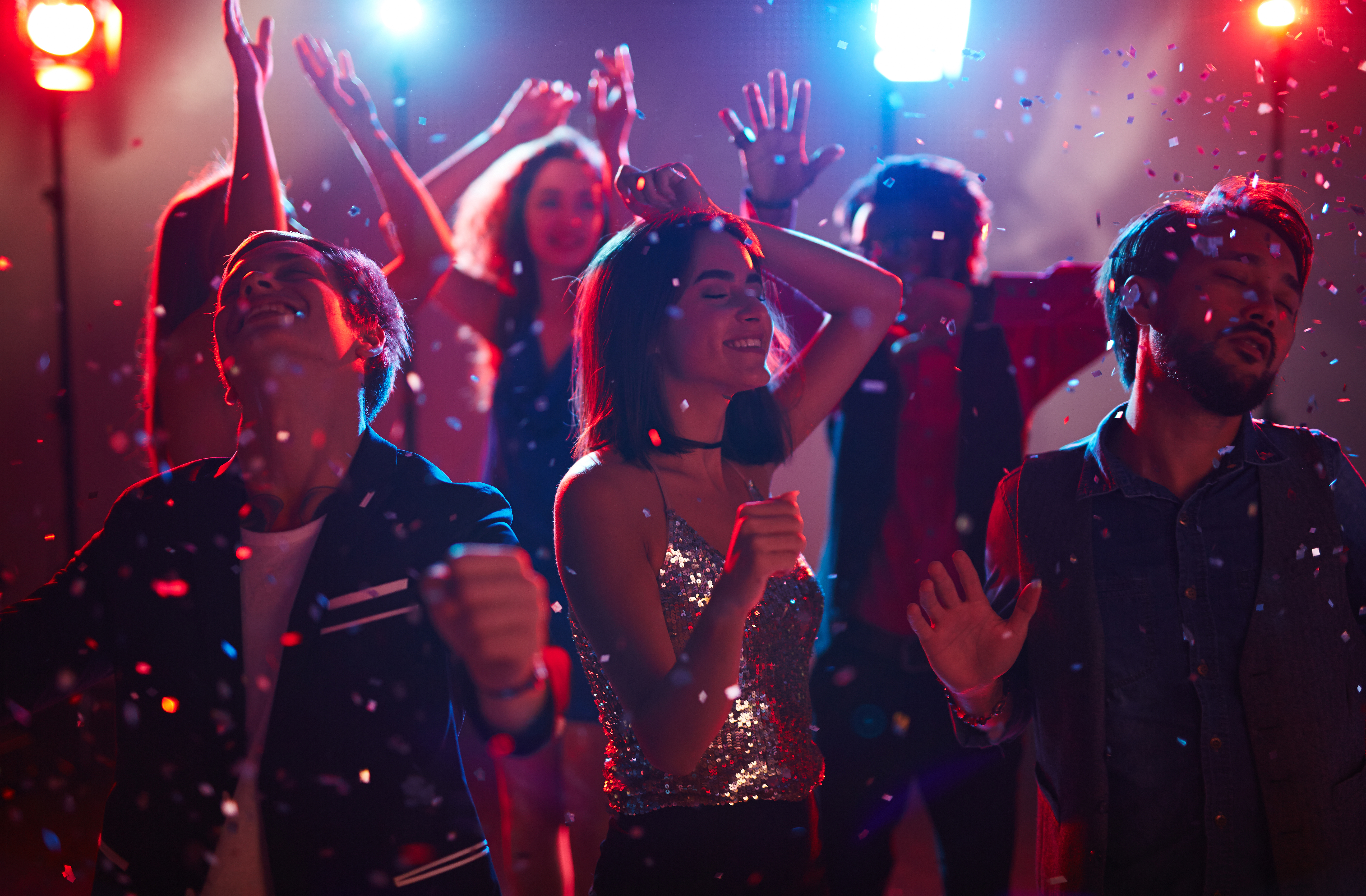 Friends dancing at a club