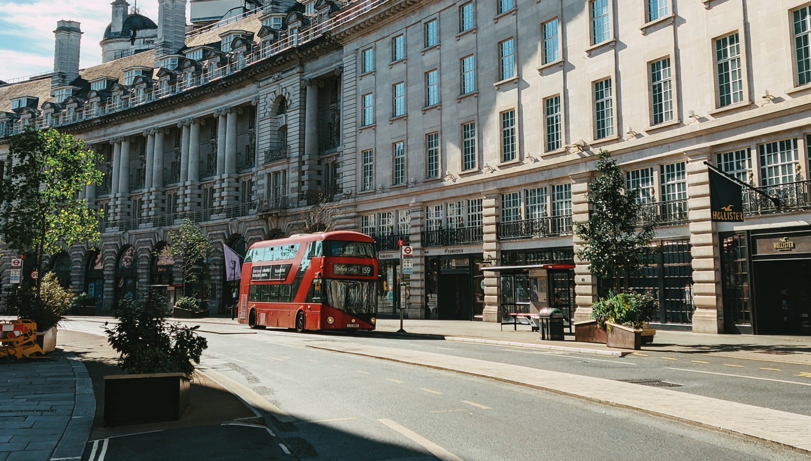 red double-decker bus on a London street