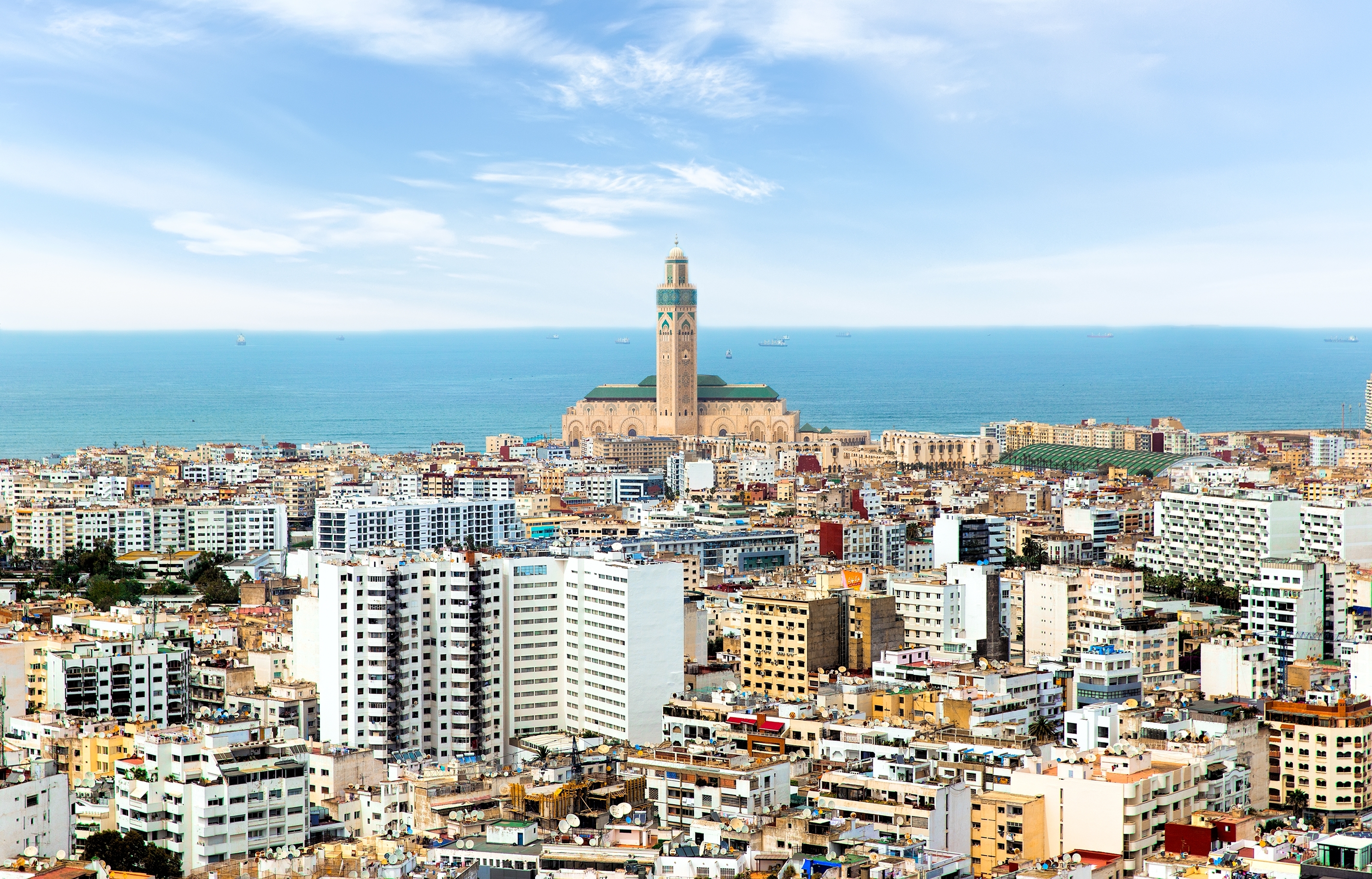 Panoramic aerial view of Casablanca, with Grand mosque Hassan II Mosque and the Atlantic ocean. Casablanca. Morocco