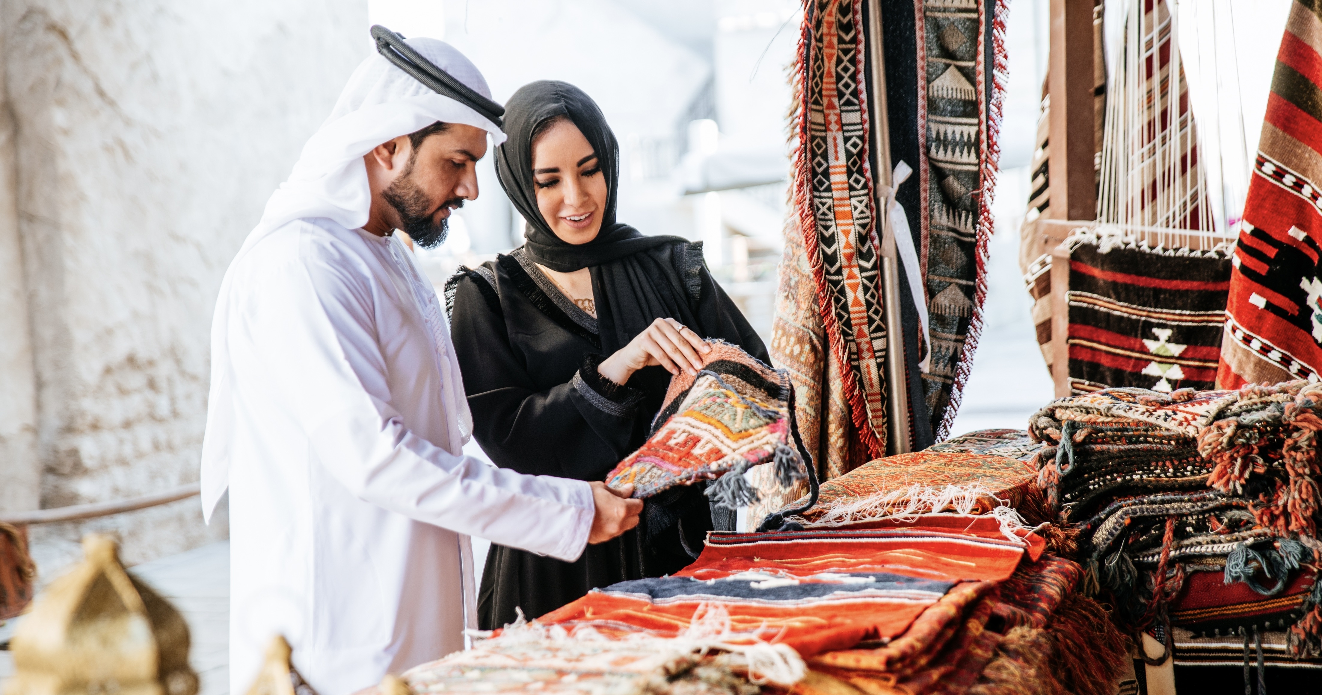 Happy couple spending time shopping for artisanal goods