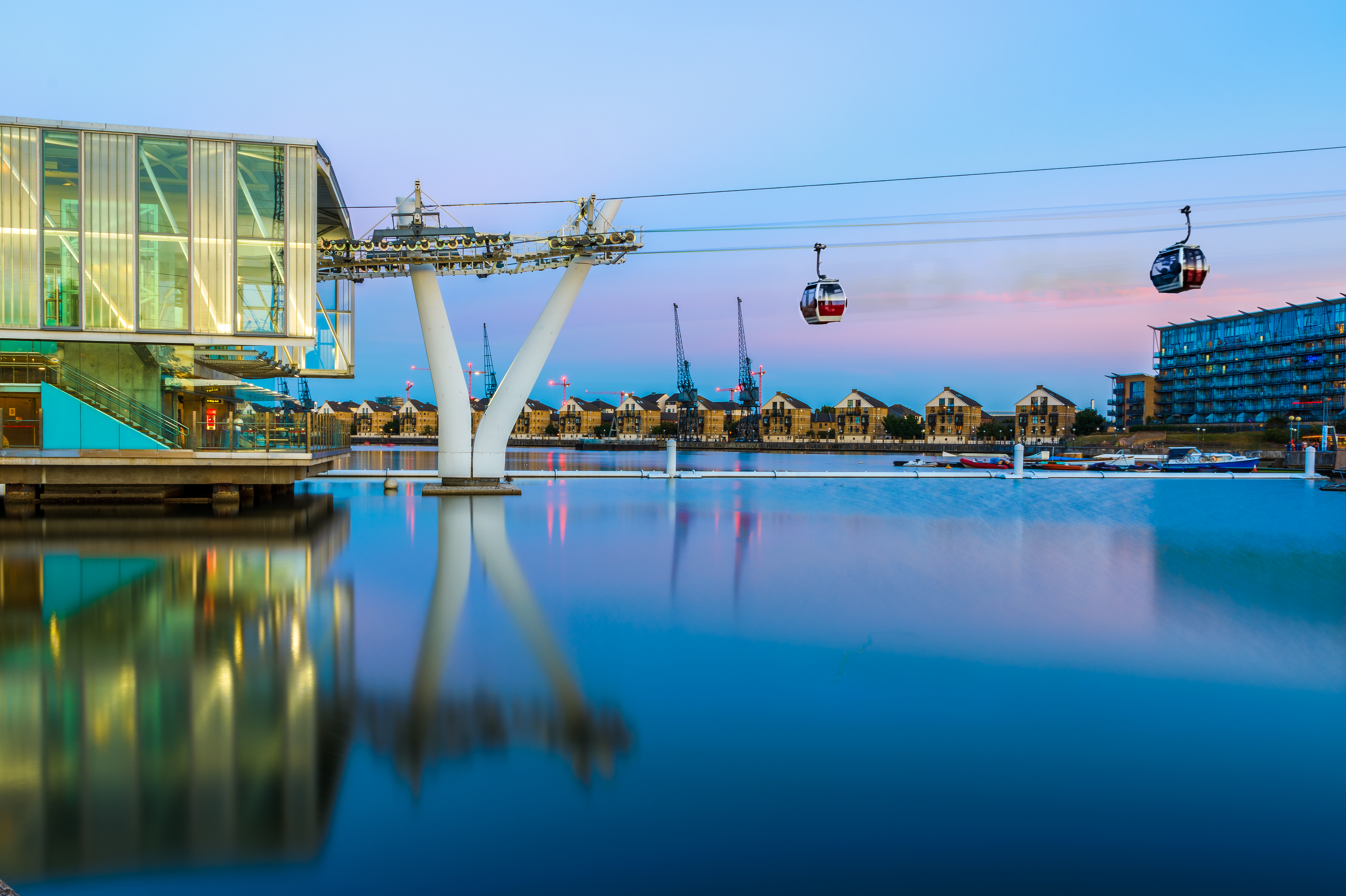 IFS Cloud Cable Car or the London cable car at sunset in London, England