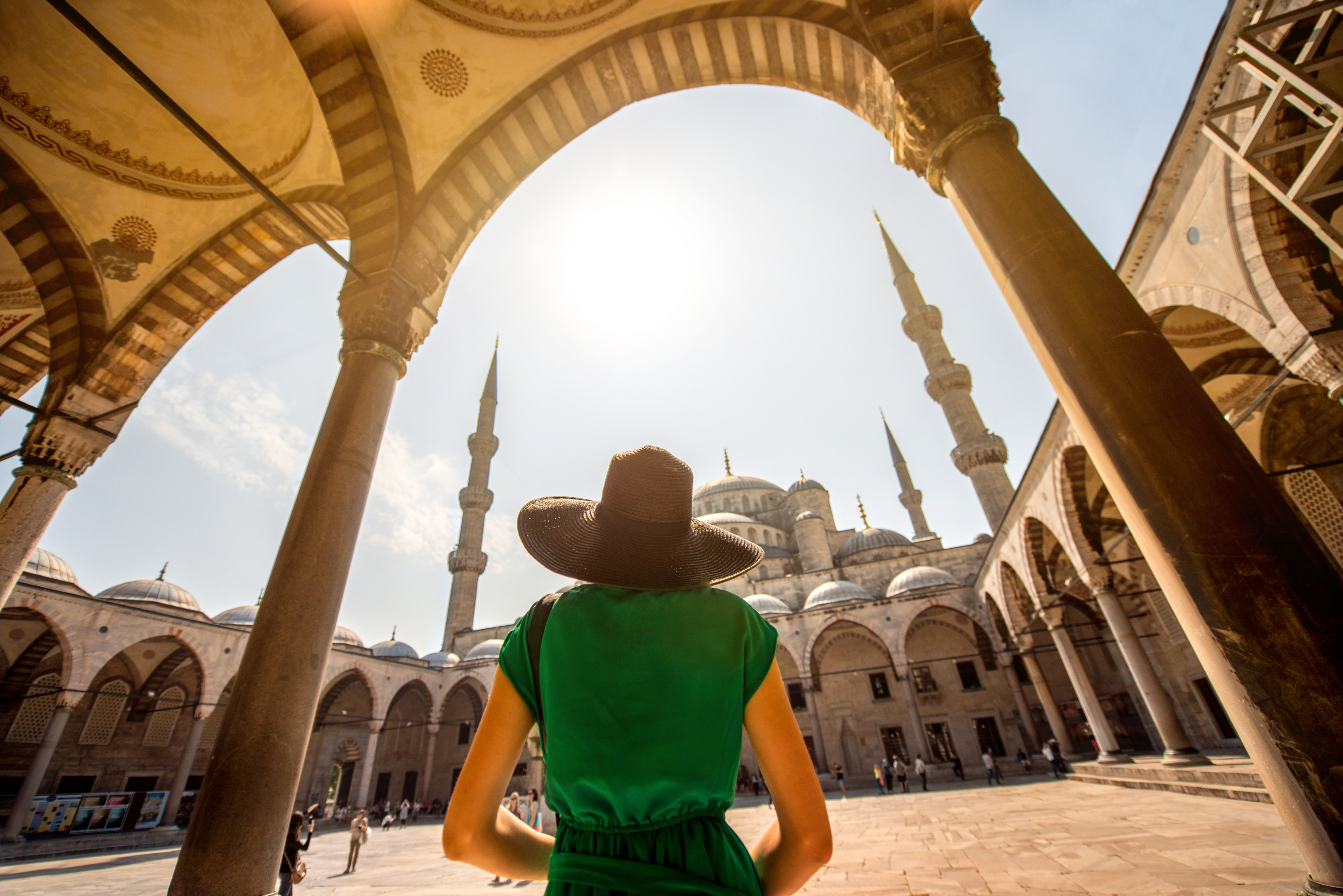 Young woman traveler looking on amazing Blue Mosque in Istanbul, Turkey