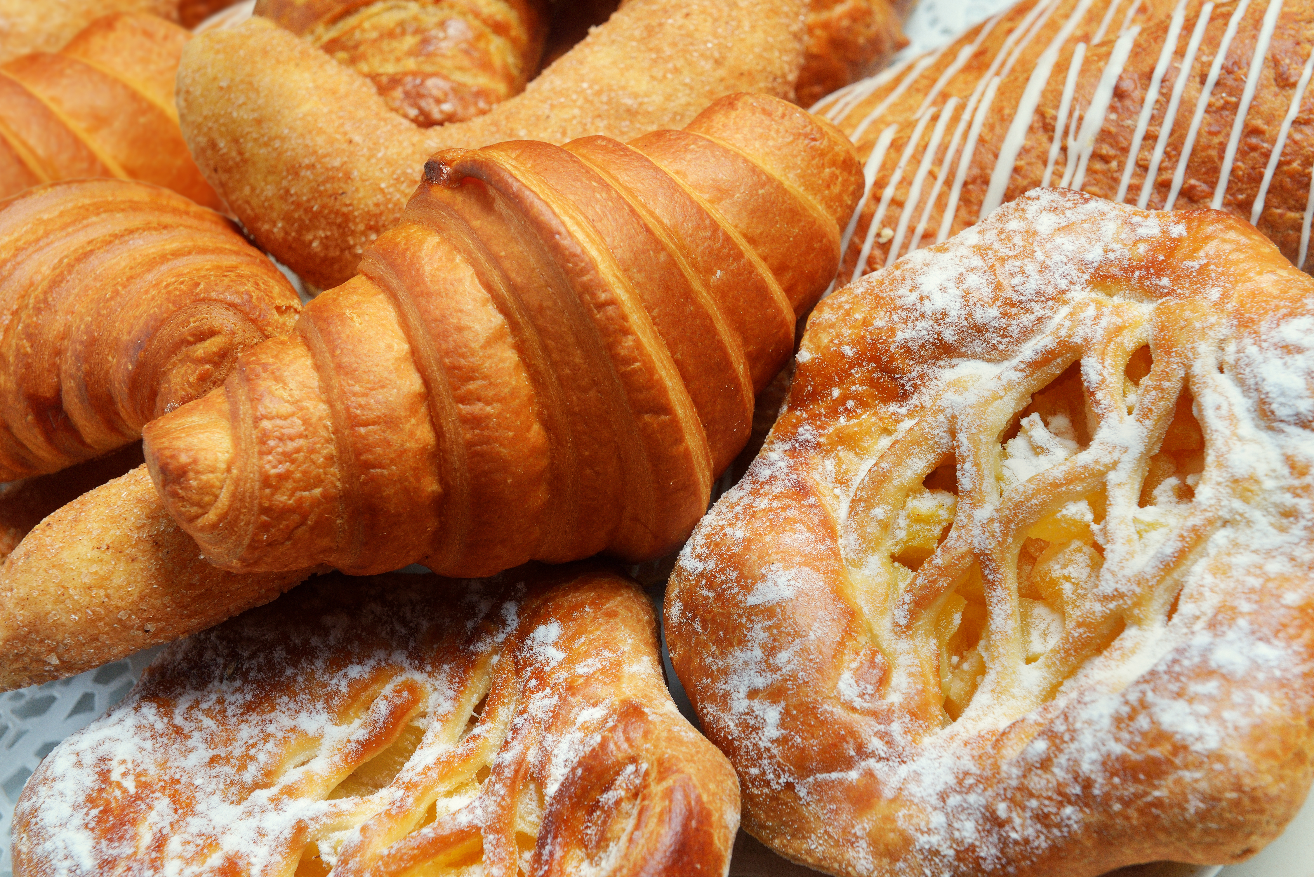 croissants and various pastries baking