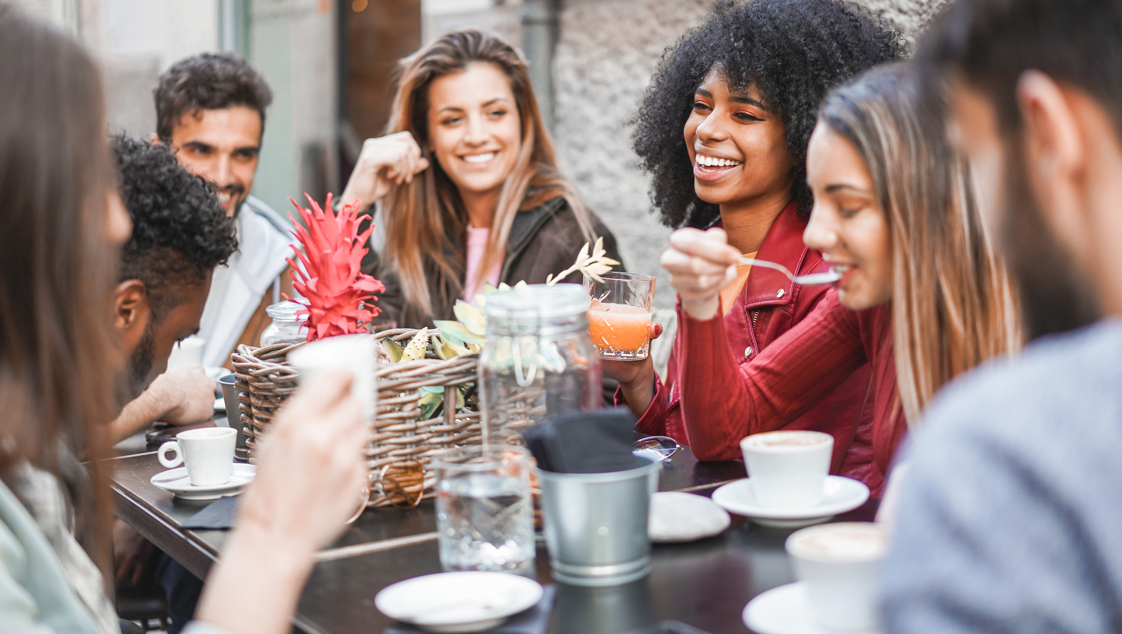 Friends enjoying coffee together, London, the United Kingdom