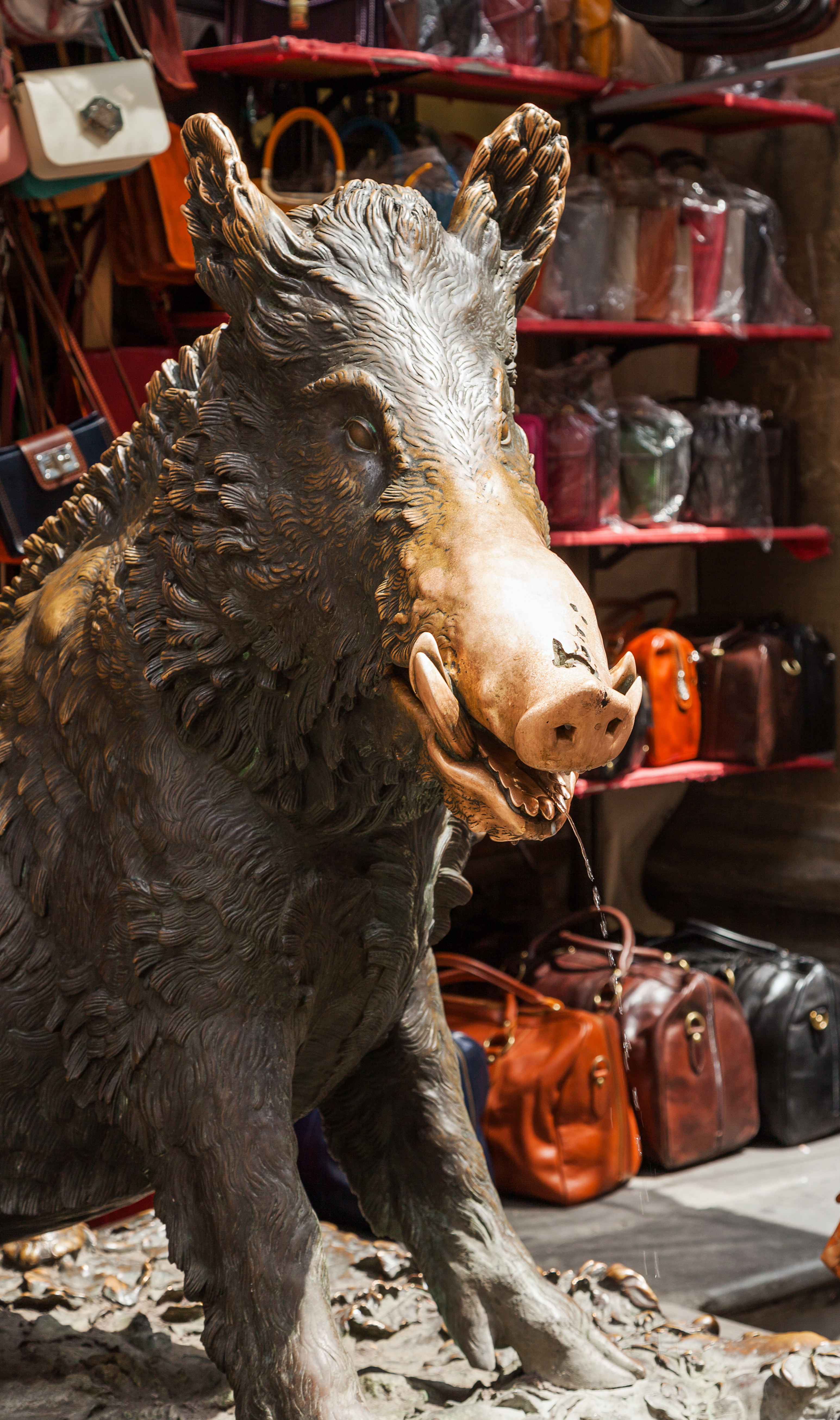 "The Little Pig" a famous bronze boar at Mercato Nuovo (market) in Florence, Tuscany, Italy.