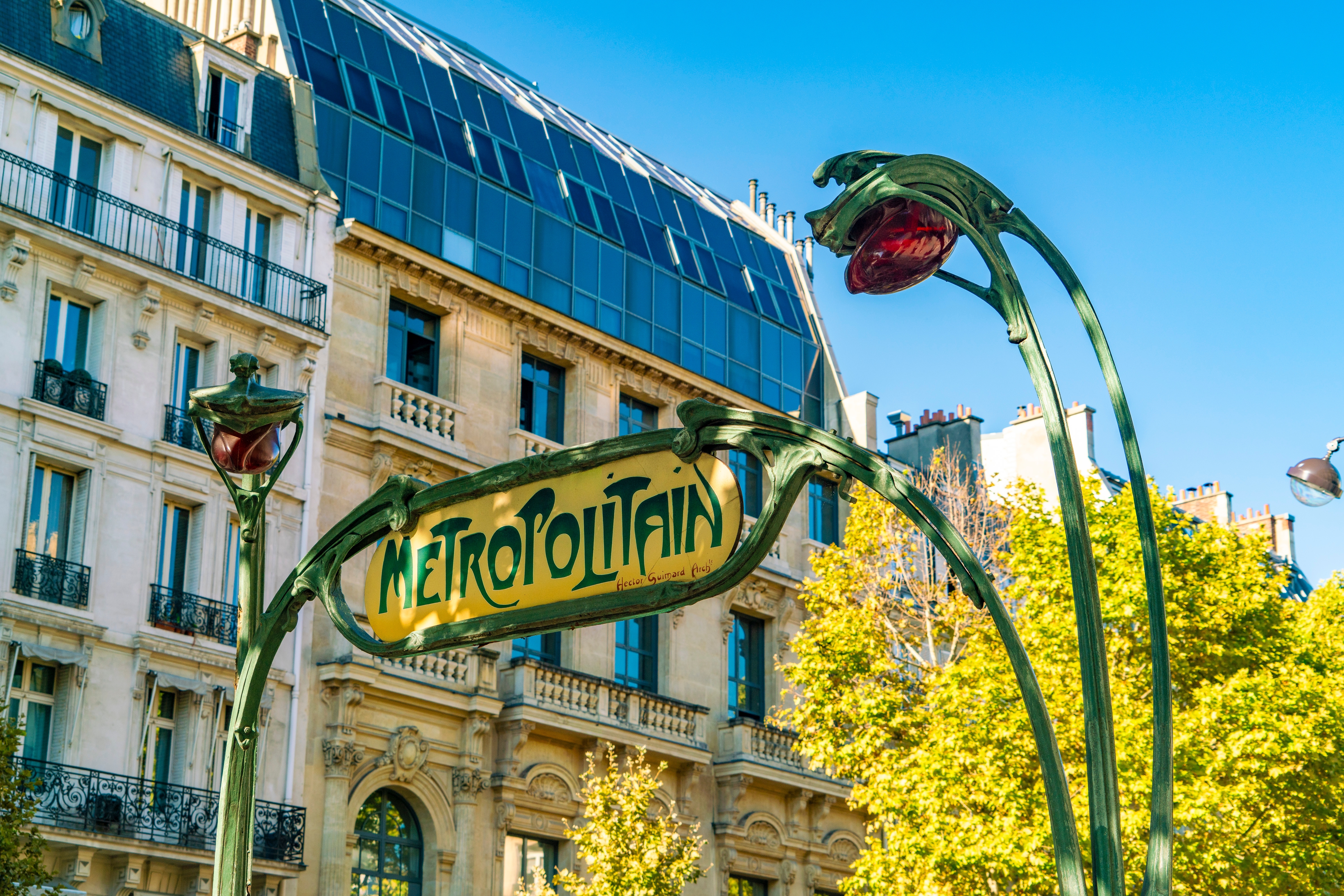 Historic Art Deco entrance metro sign in Paris, France