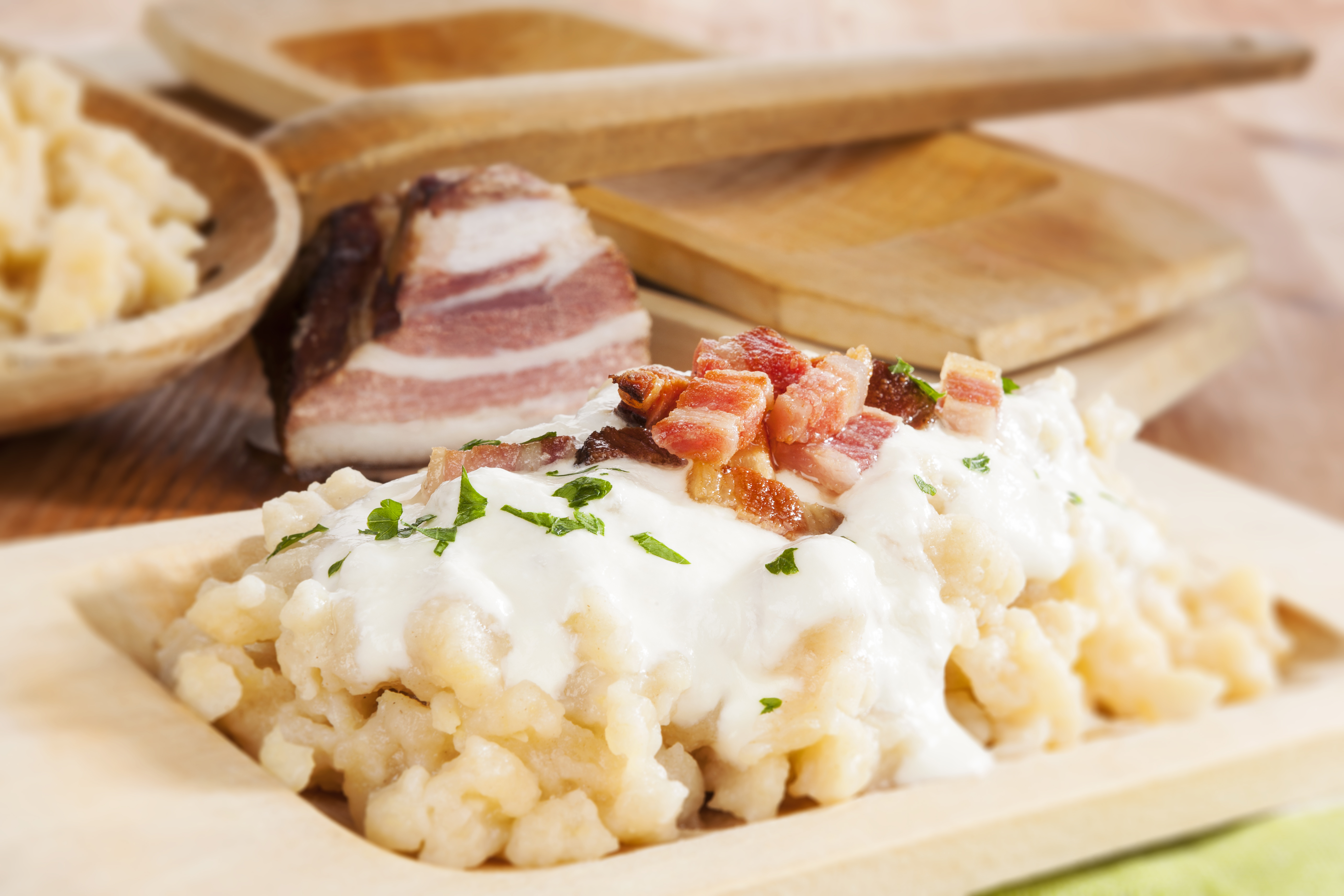 Bryndzove halusky. Potato dumplings with bryndza sheep cheese and bacon. Bryndzove halusky, traditional national slovak food.