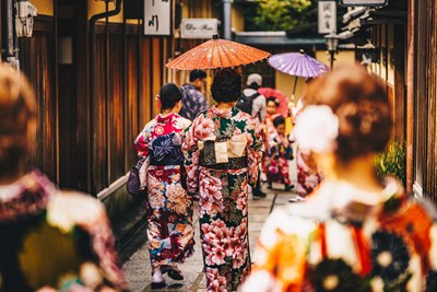 Women in traditional japanese kimonos walking in Kyoto - Calin Stan/Shutterstock.com