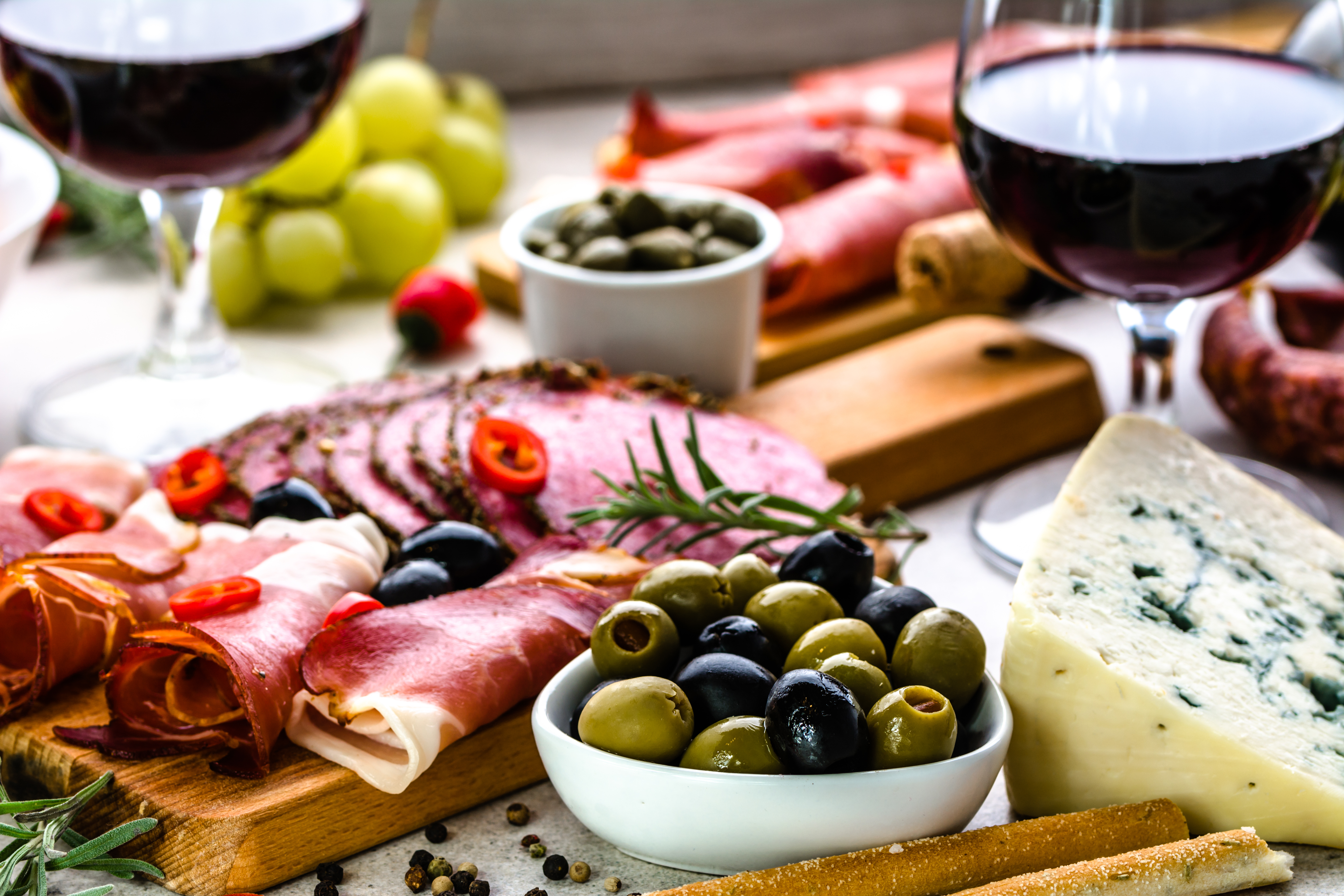 Variety food on table, wine snack set, olives, cheese and other appetizer