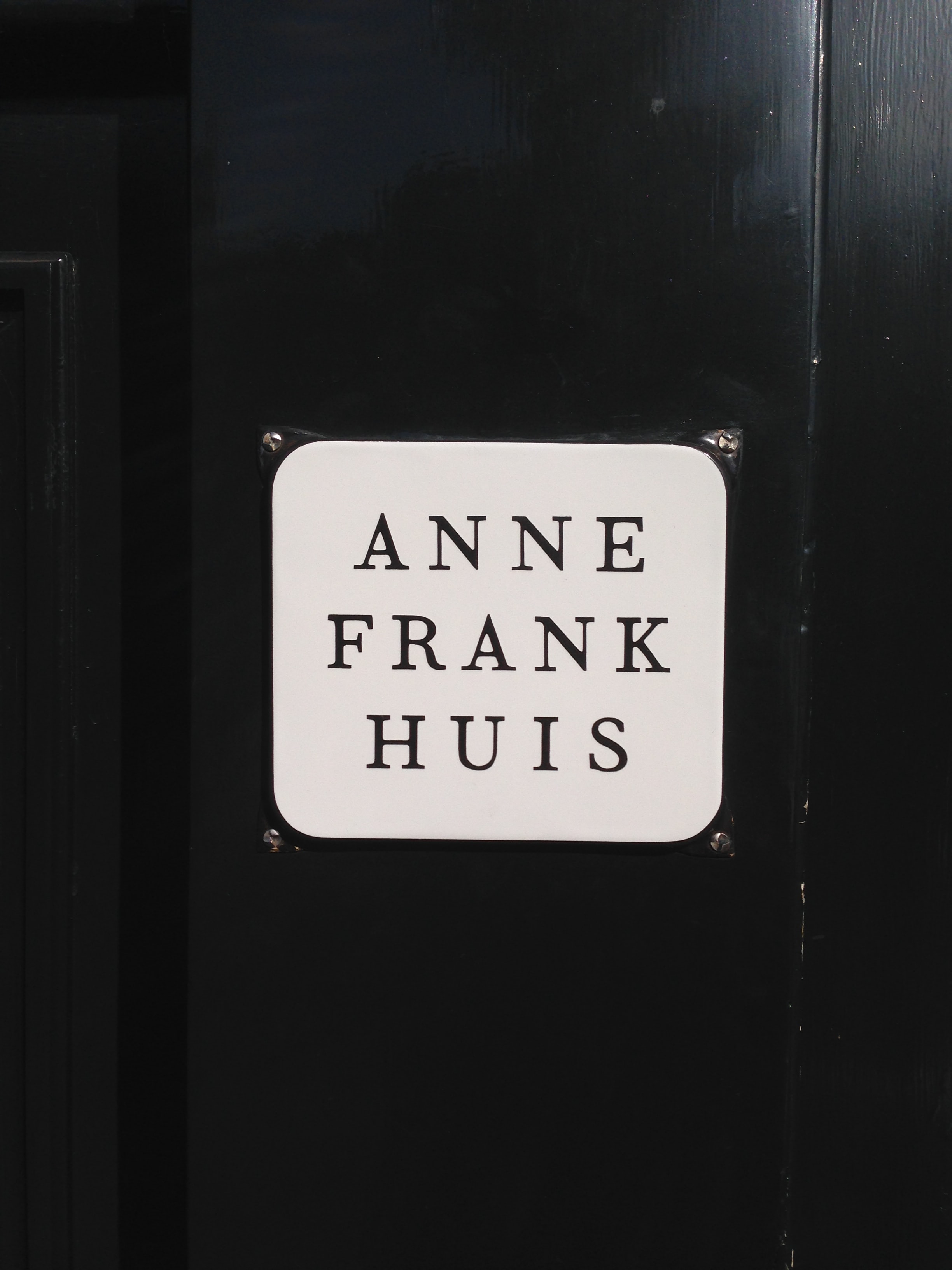 a plack on the door of Anne-Frank-House (Anne-Frankhuis) in Amsterdam, the Netherlands
