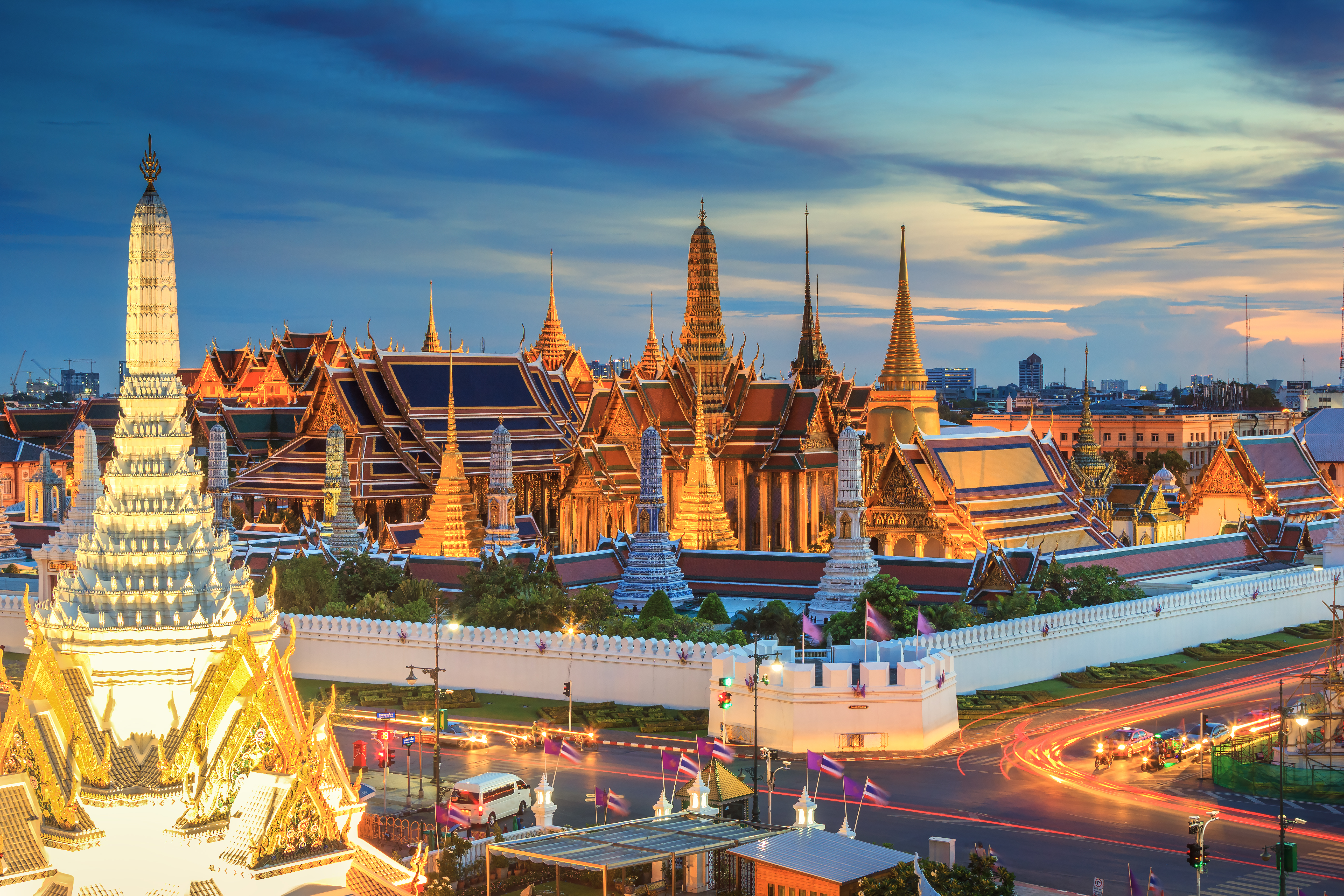 Grand palace and Wat phra keaw at sunset Bangkok, Thailand. Beautiful Landmark of Asia. Temple of the Emerald Buddha. landscape of the capital city. view of thailand