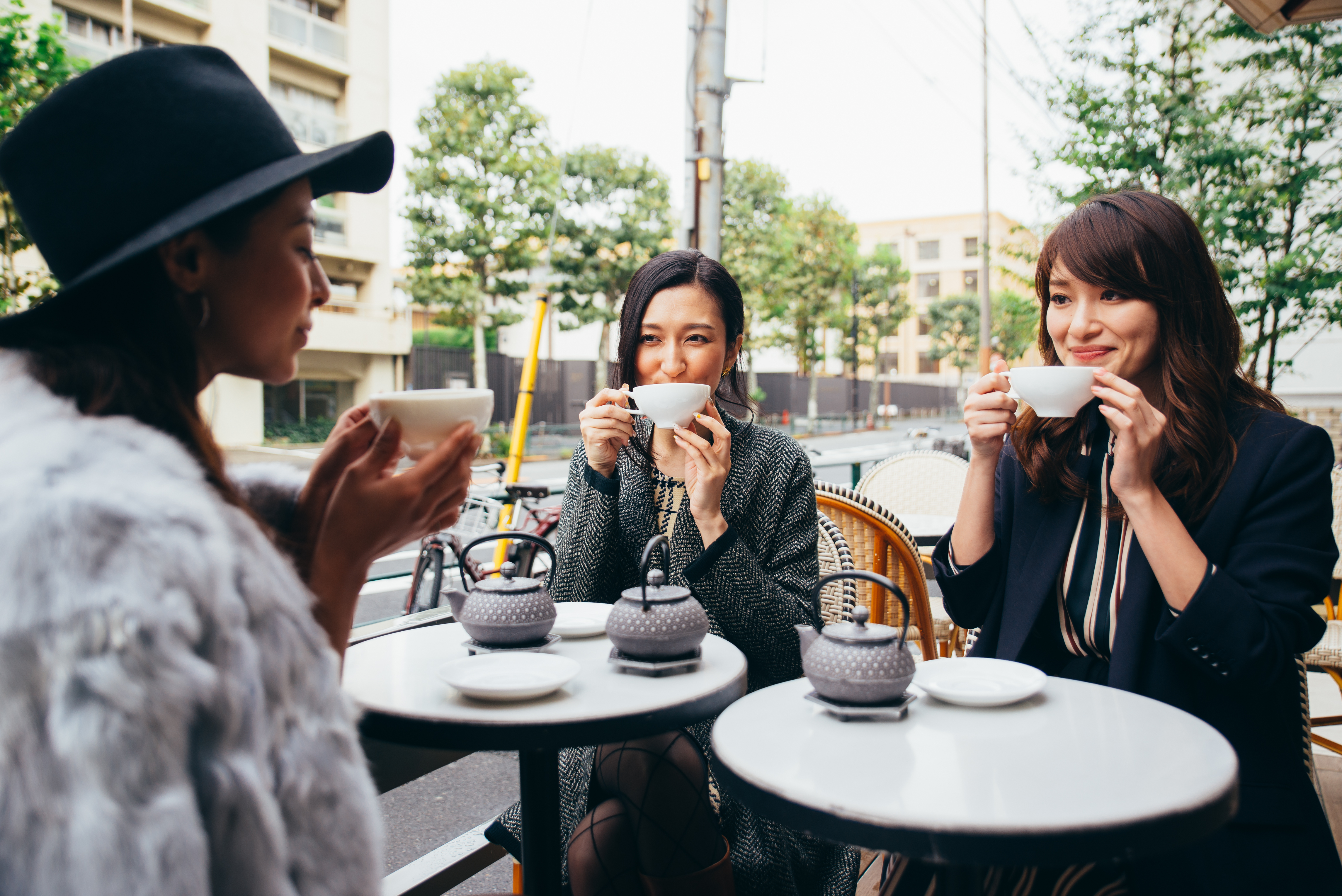 Group of japanese friends spending time in Tokyo and having fun