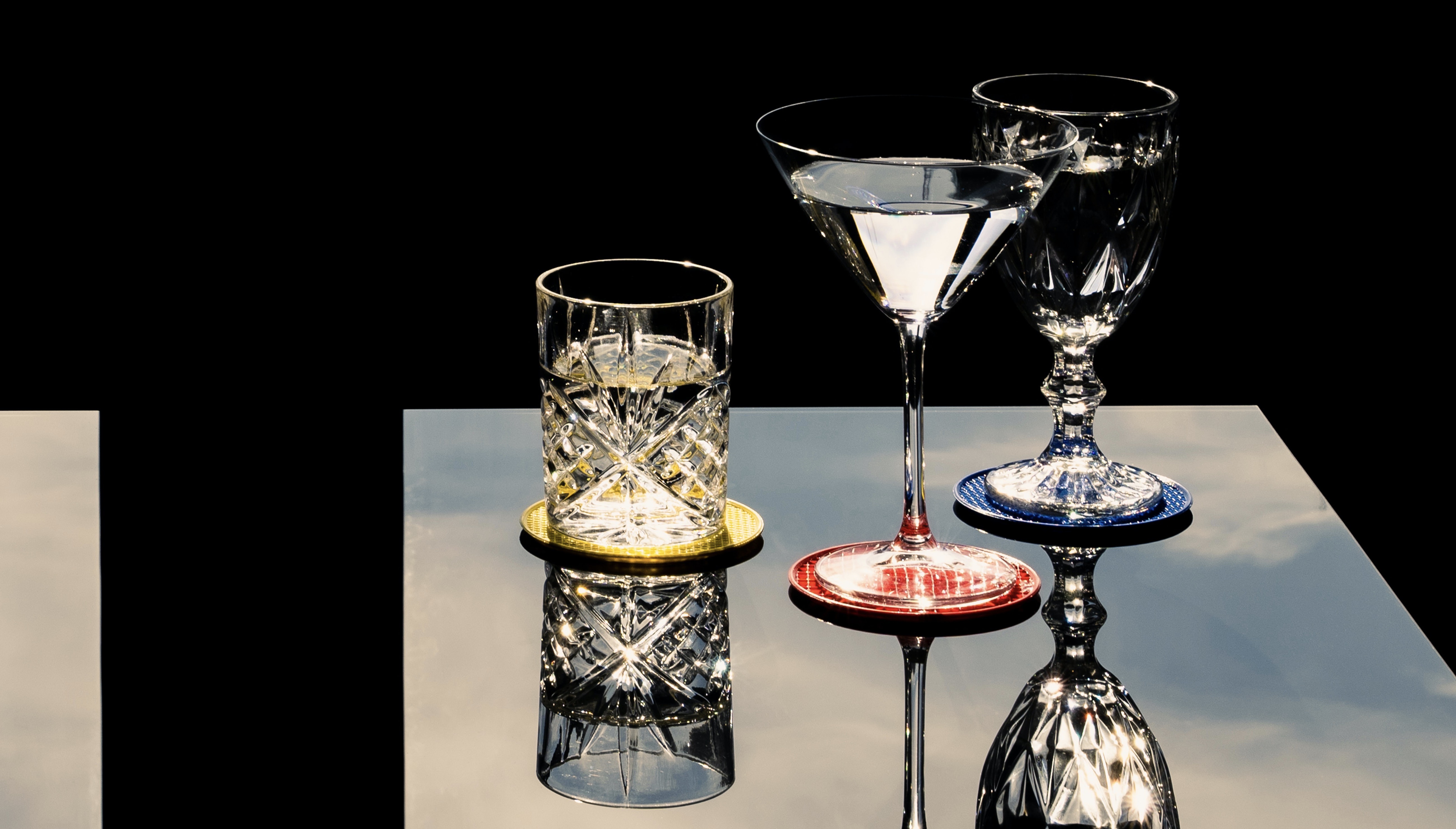beautiful crystal glasses on a mirror surface, Martini Bar at Dolce & Gabbana, Milan, Italy