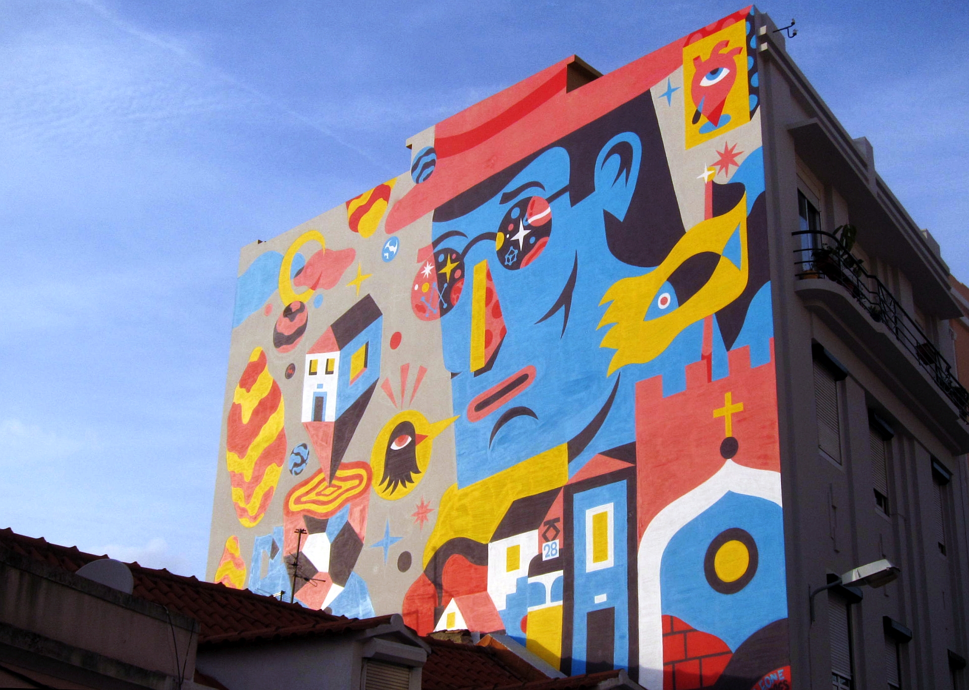 Desassossego, mural by Akacorleone (Pedro Campiche, b. 1985), represented by Galeria Underdogs, on a facade of a building on Rua Damasceno Monteiro, Lisbon.