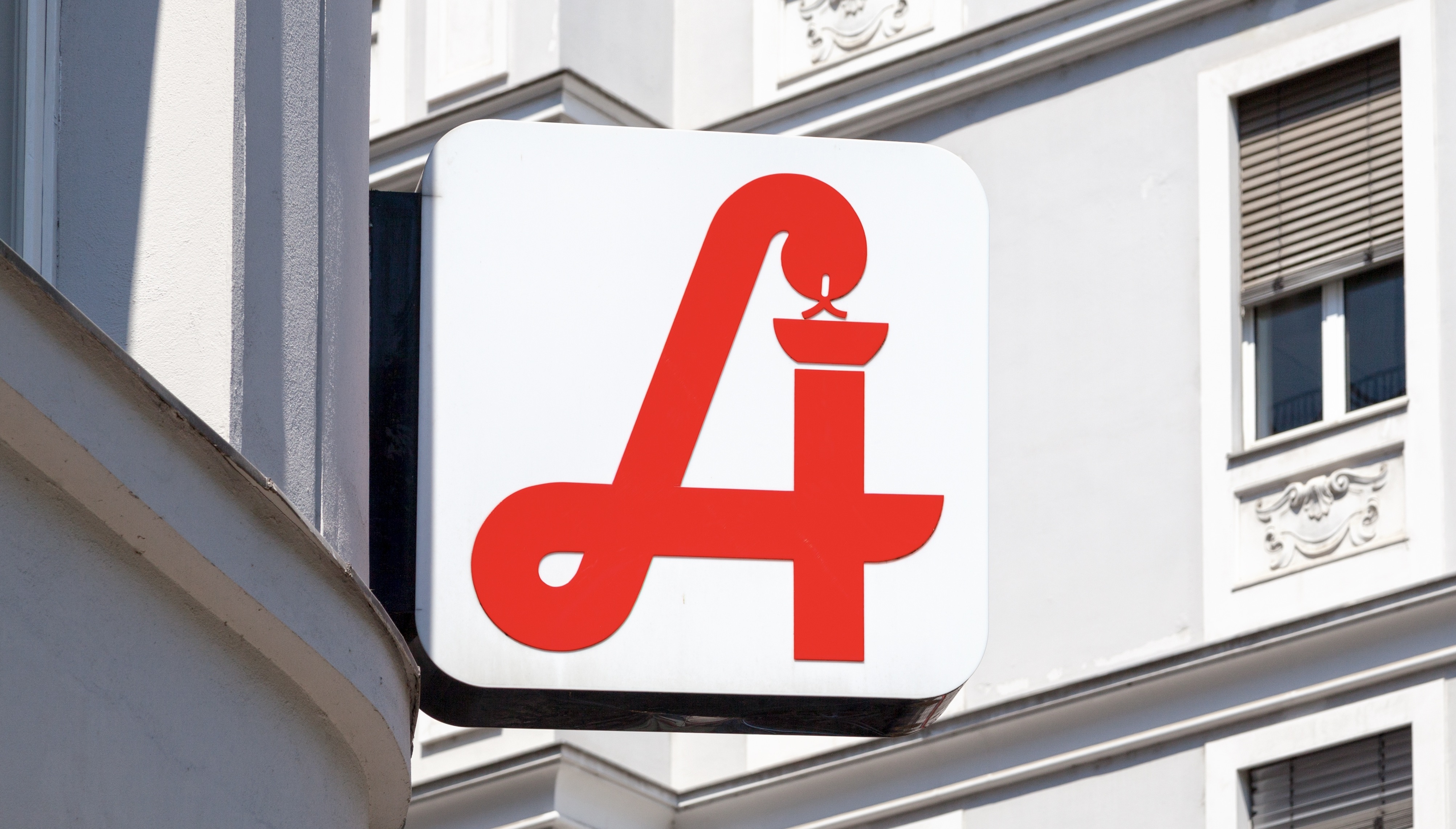 Austrian pharmacy displaying the traditional pharmacy sign used in the country.