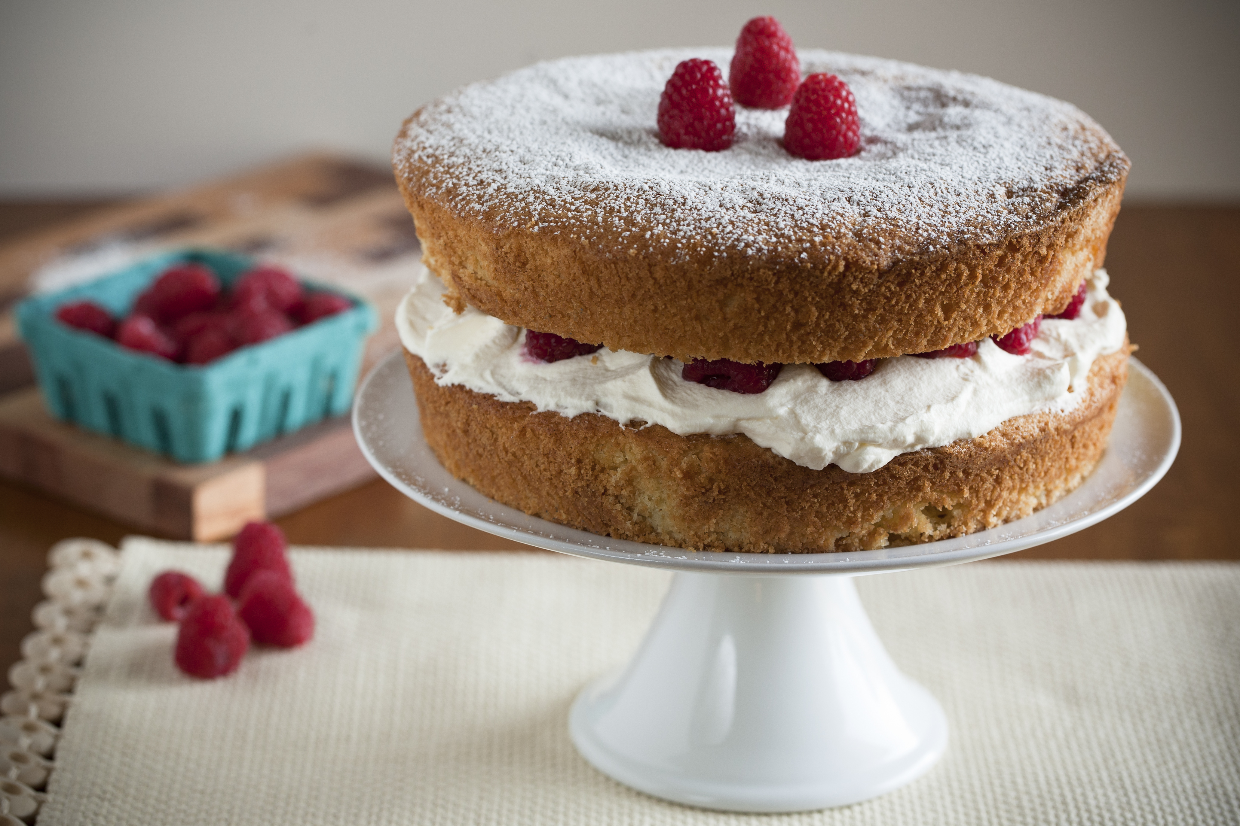 Victoria Sponge Cake with Whipped Cream and Raspberries