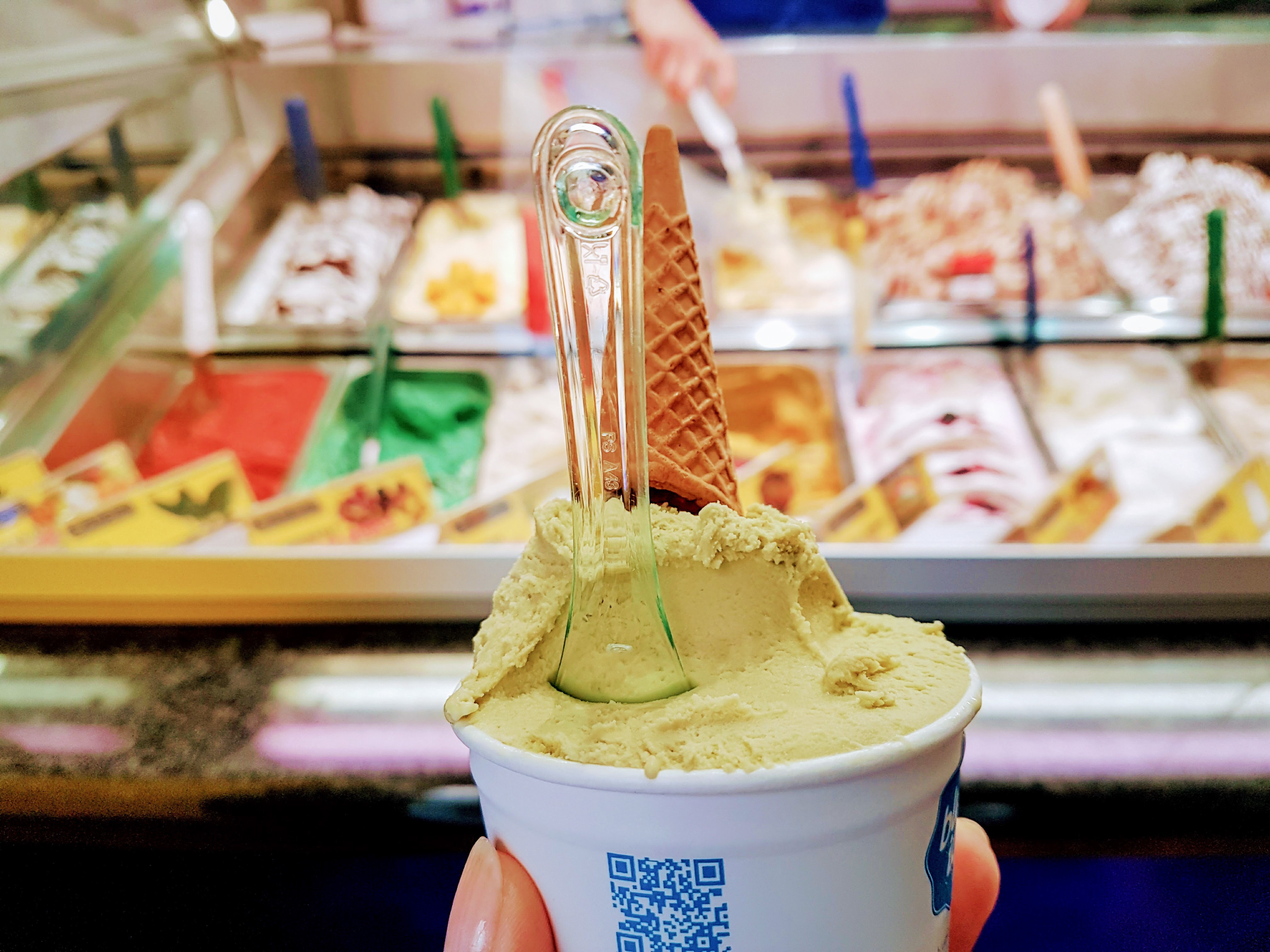 ice cream in a cup in front of a freezer, Der Eisladen Kaulsdorf, Berlin, Germany
