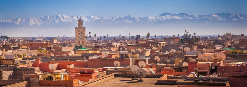 Panoramic view of Marrakesh and the snow capped Atlas mountains, Morocco