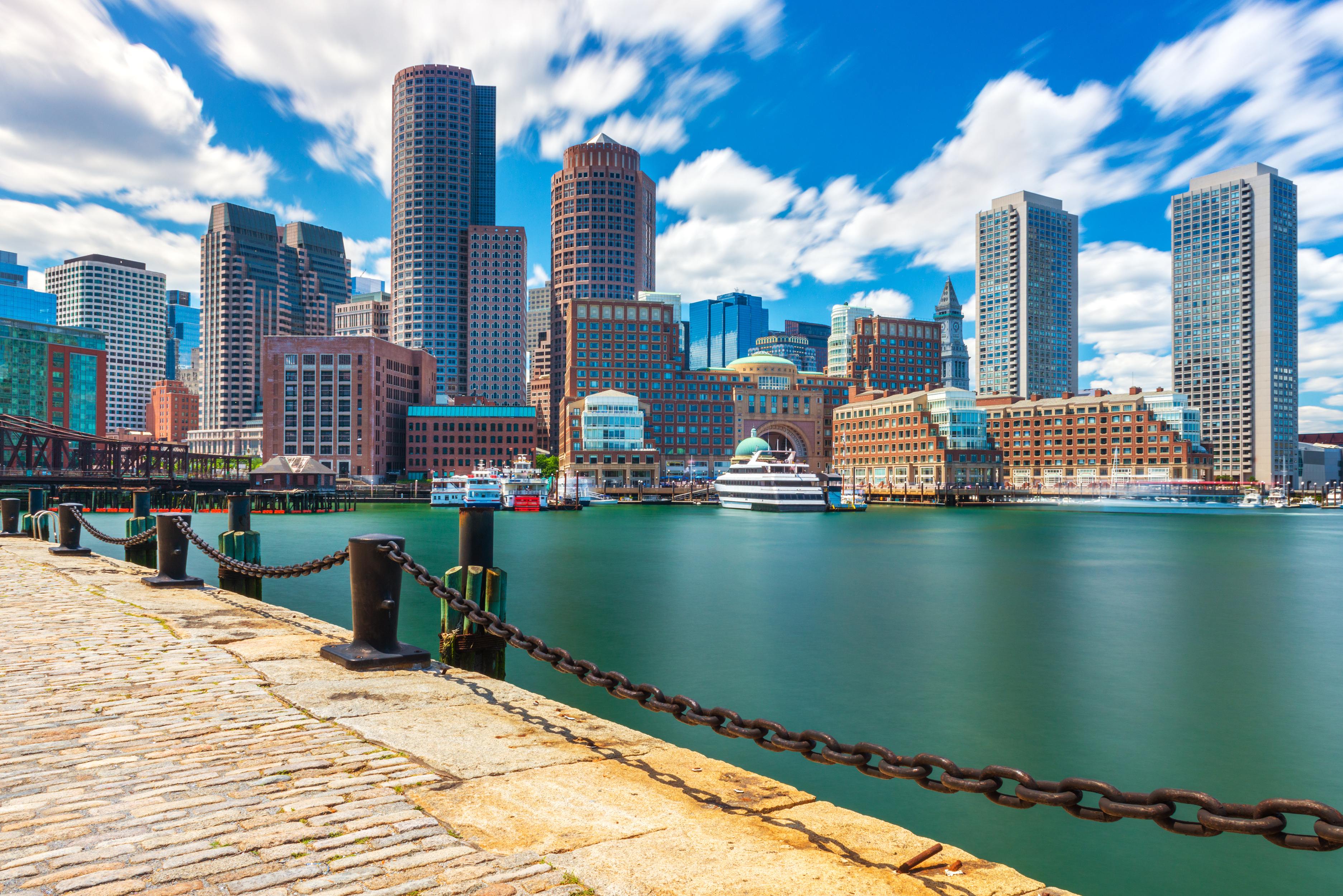 Boston cityscape in sunny day, view from harbor on downtown, Massachusetts, USA