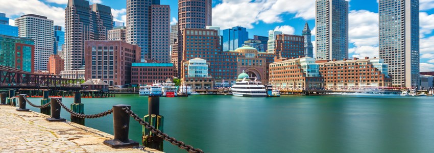 Boston cityscape in sunny day, view from harbor on downtown, Massachusetts, USA